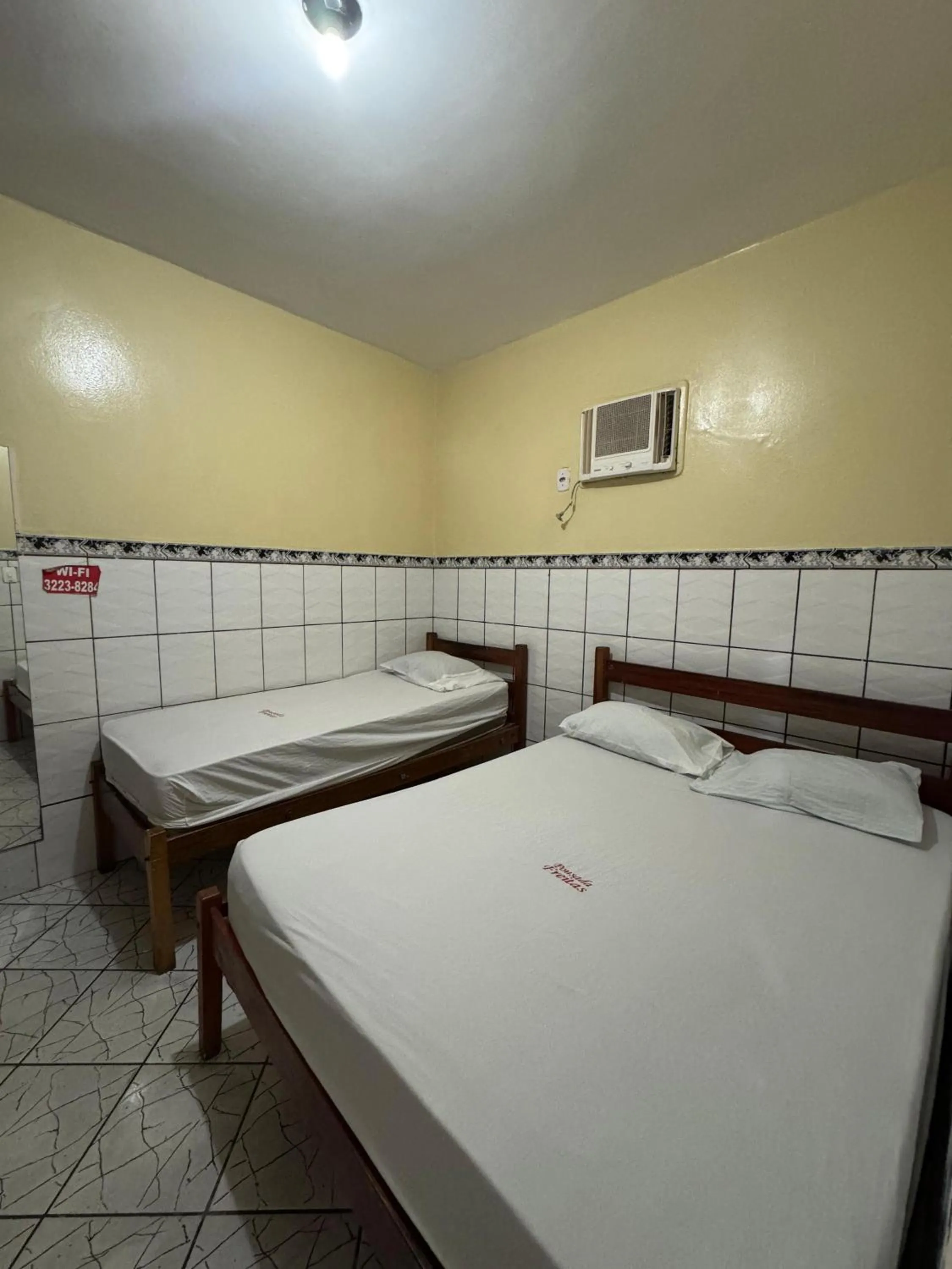Bed in Pousada Freitas