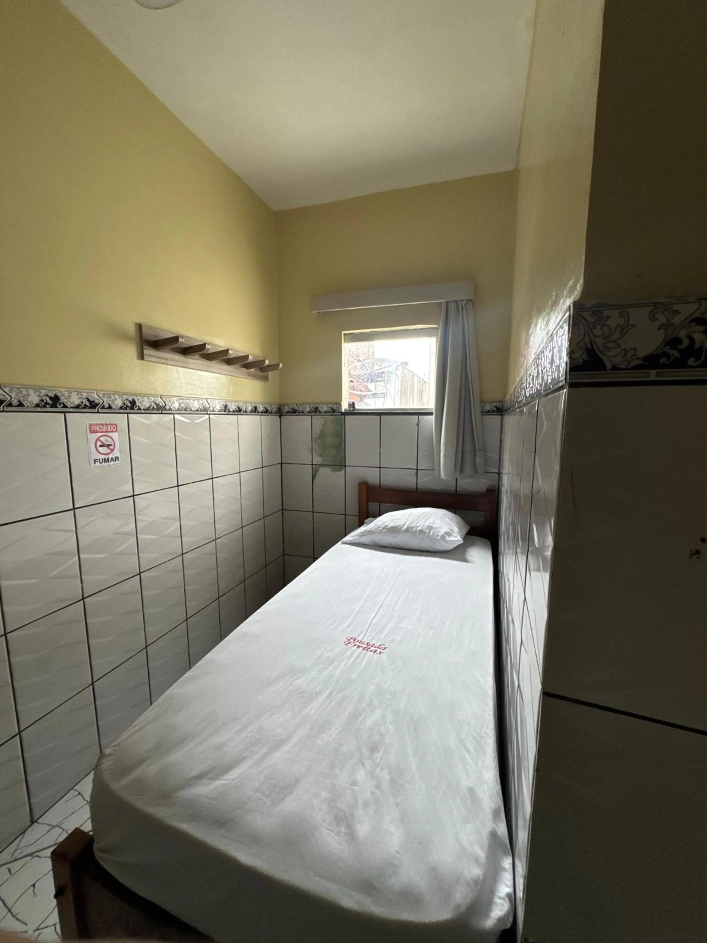 Bed in Pousada Freitas