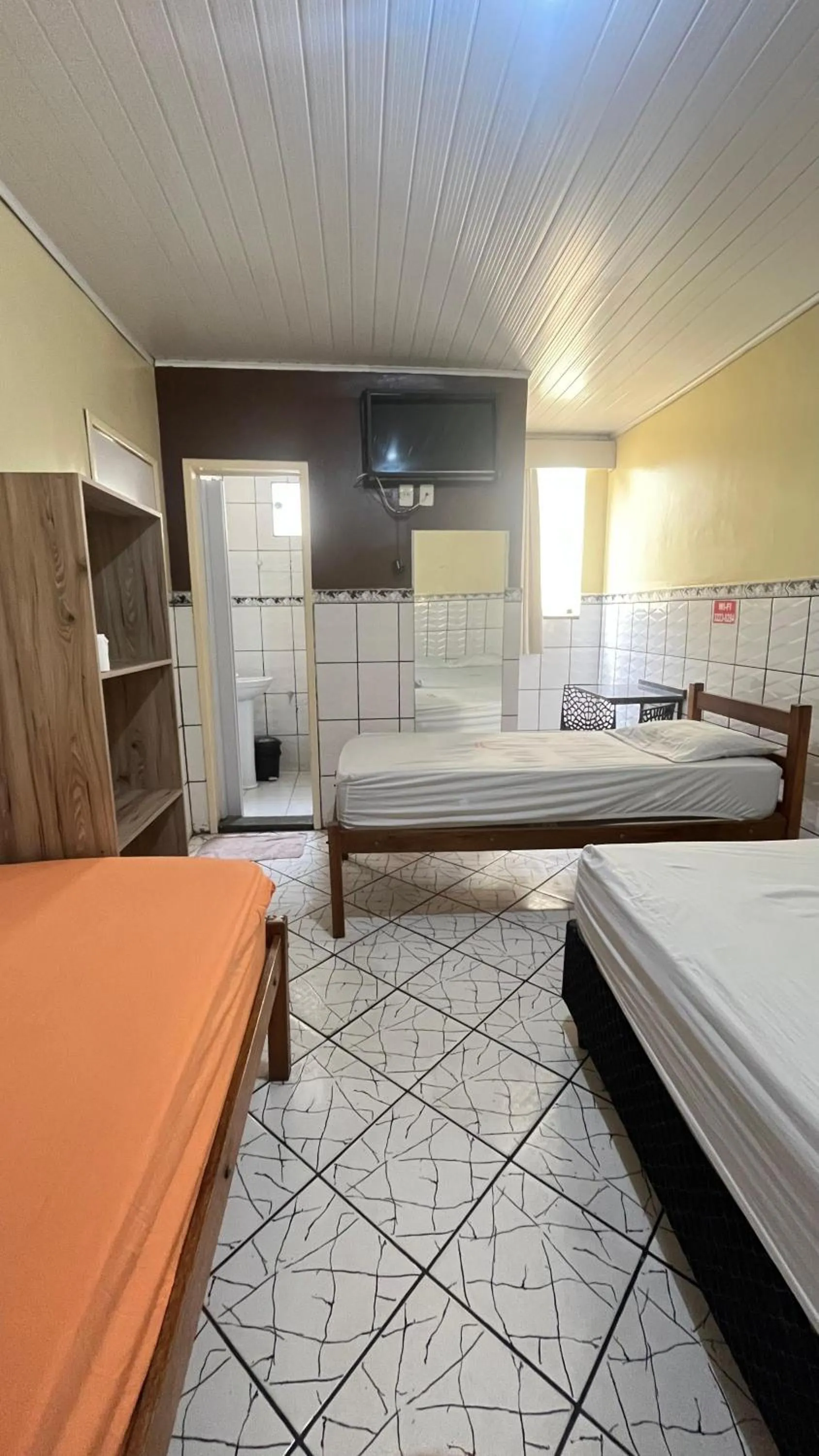 Bed in Pousada Freitas