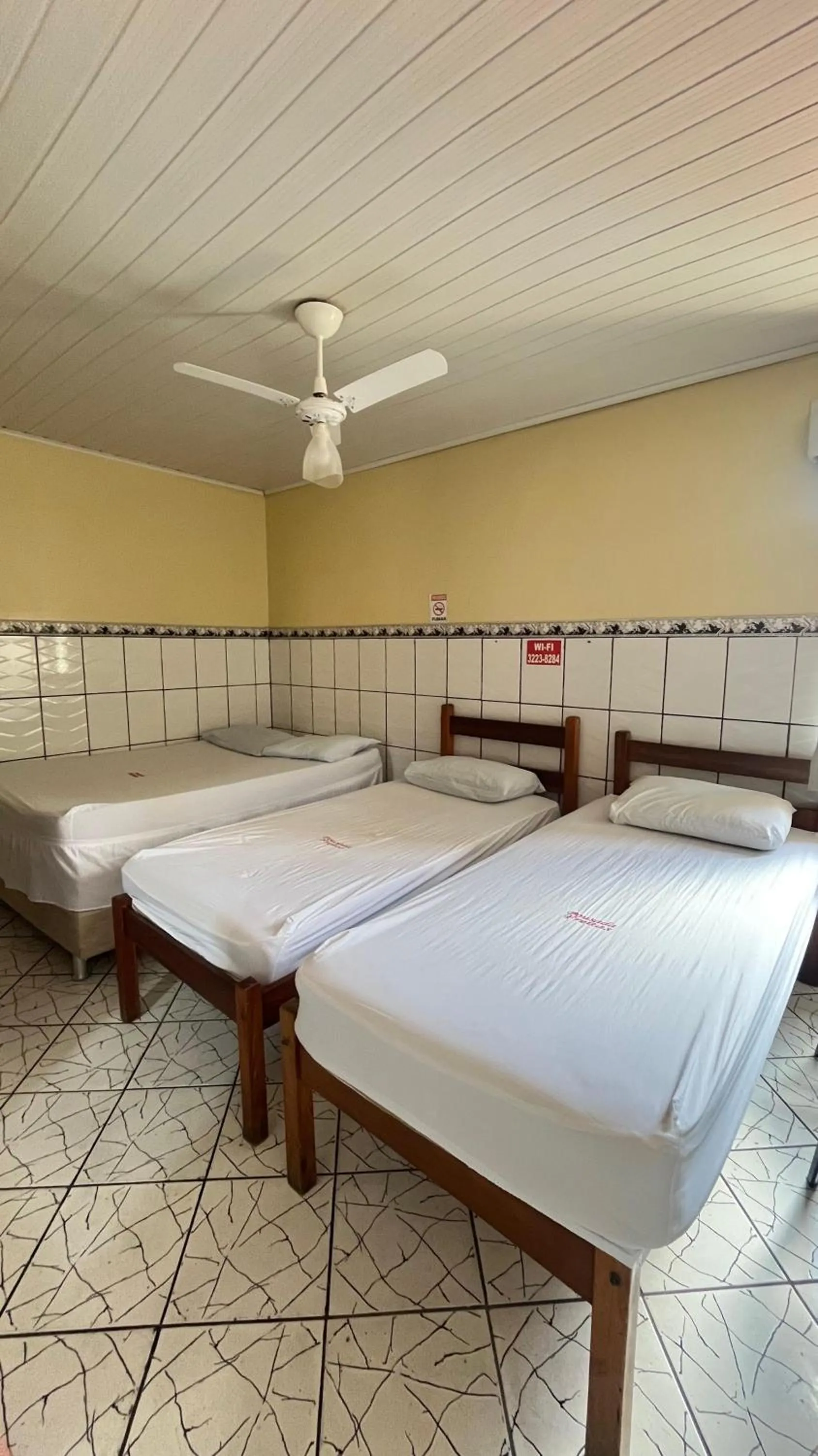 Bed in Pousada Freitas