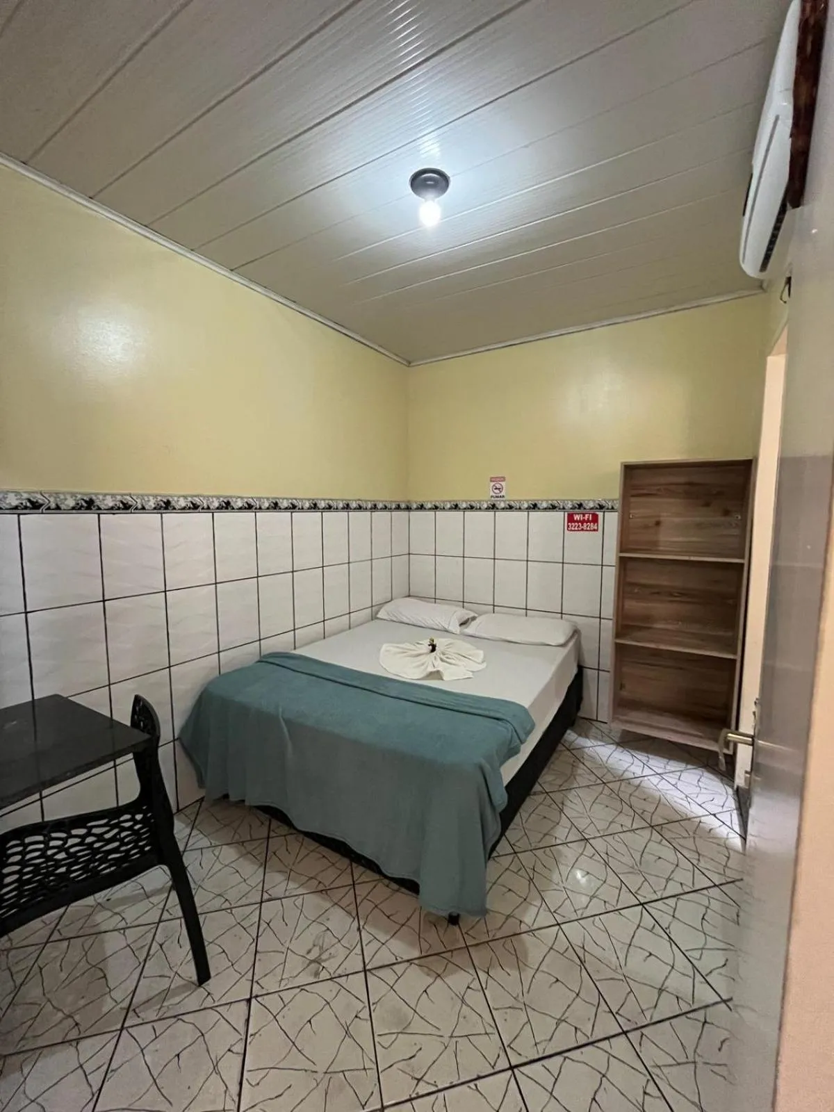 Bed in Pousada Freitas