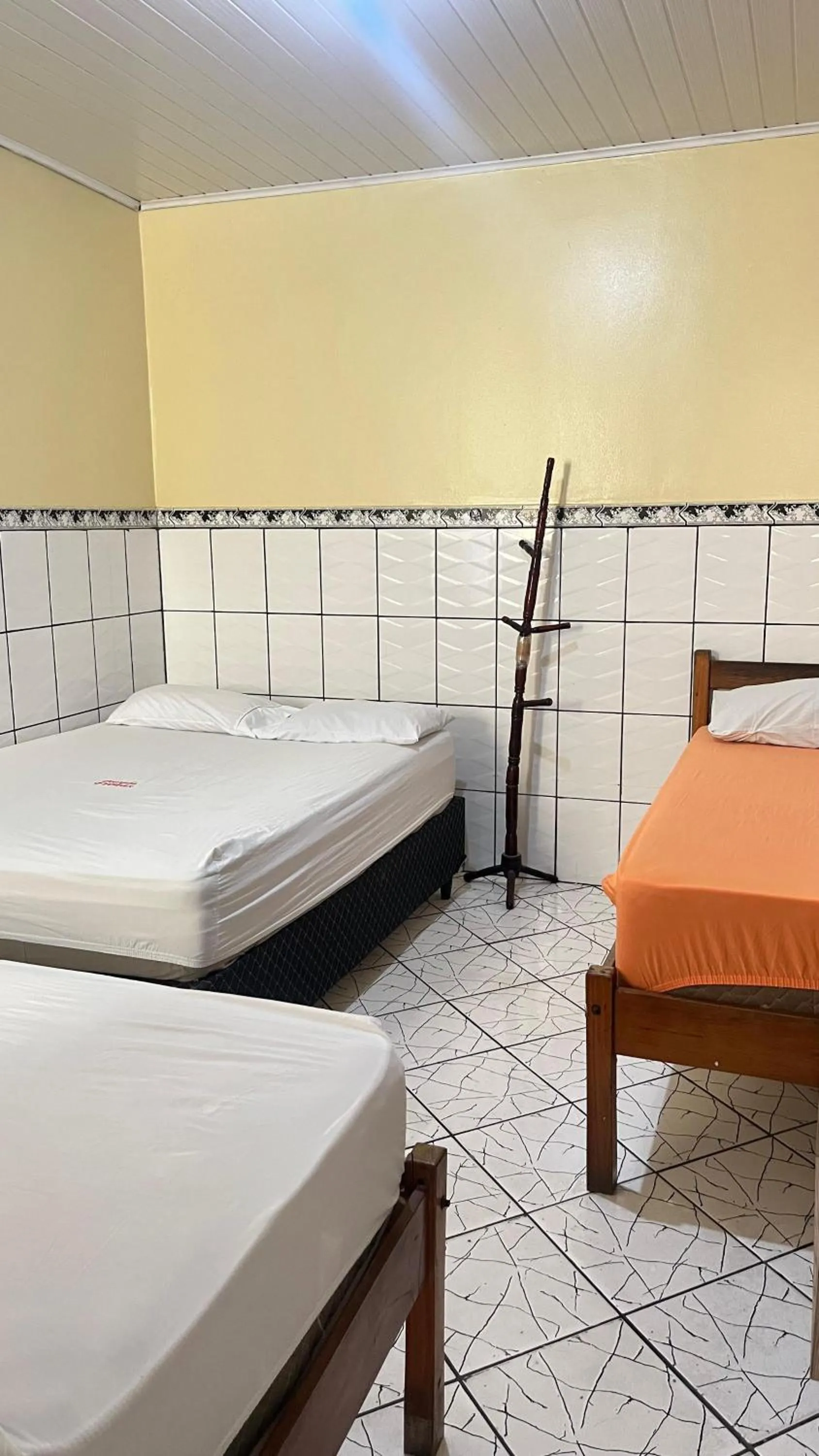 Bed in Pousada Freitas