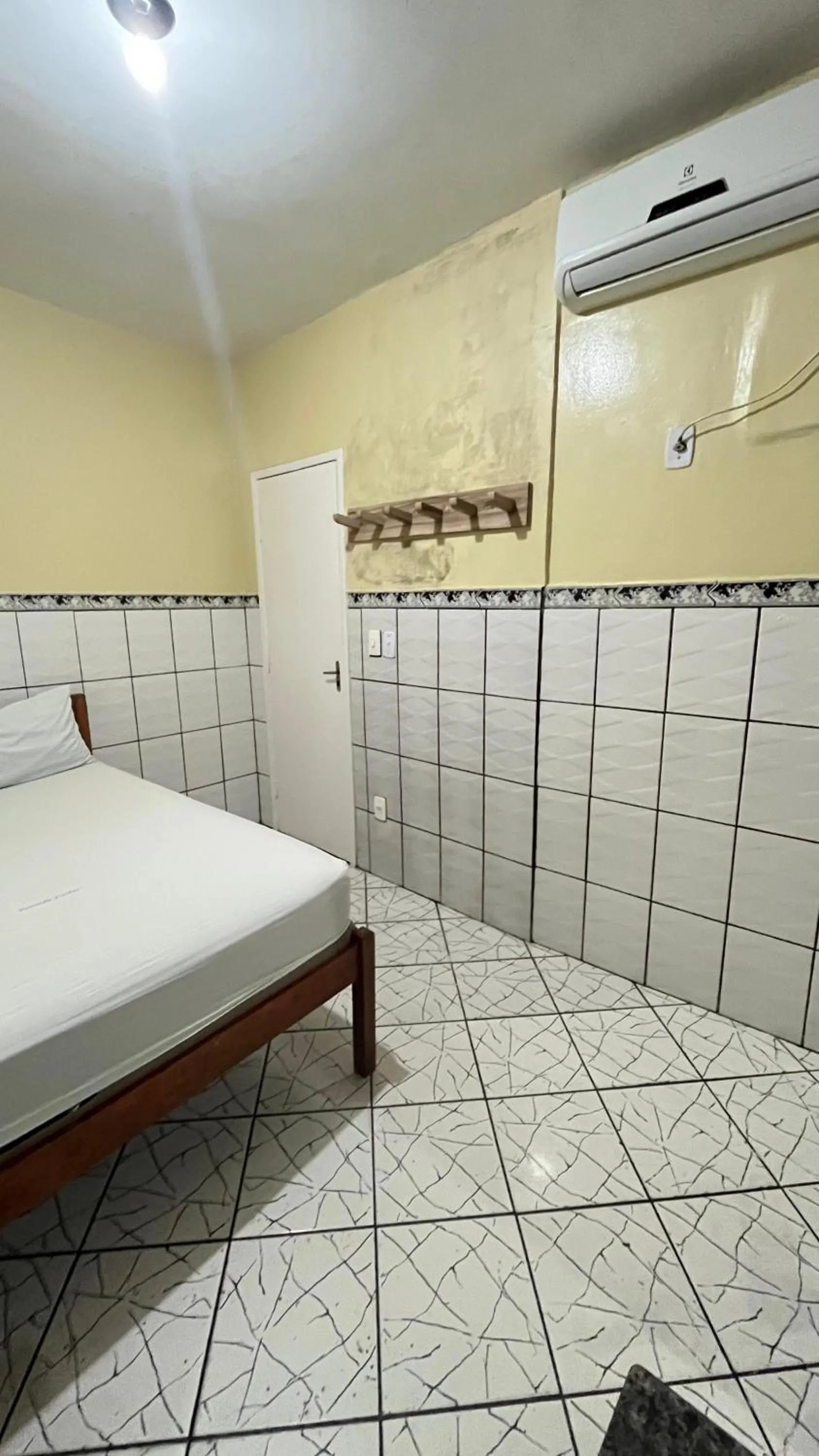 Bed in Pousada Freitas