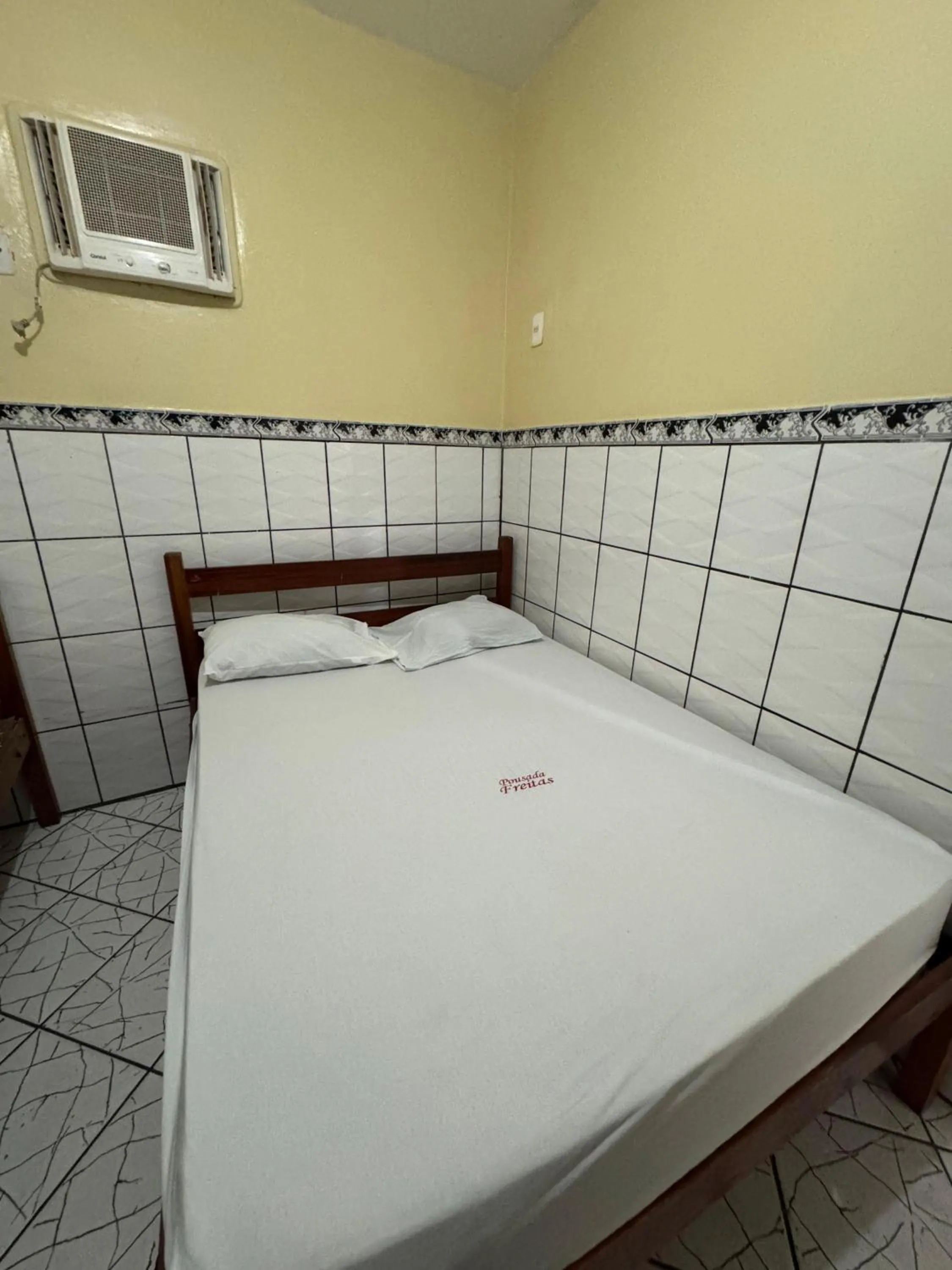Bed in Pousada Freitas
