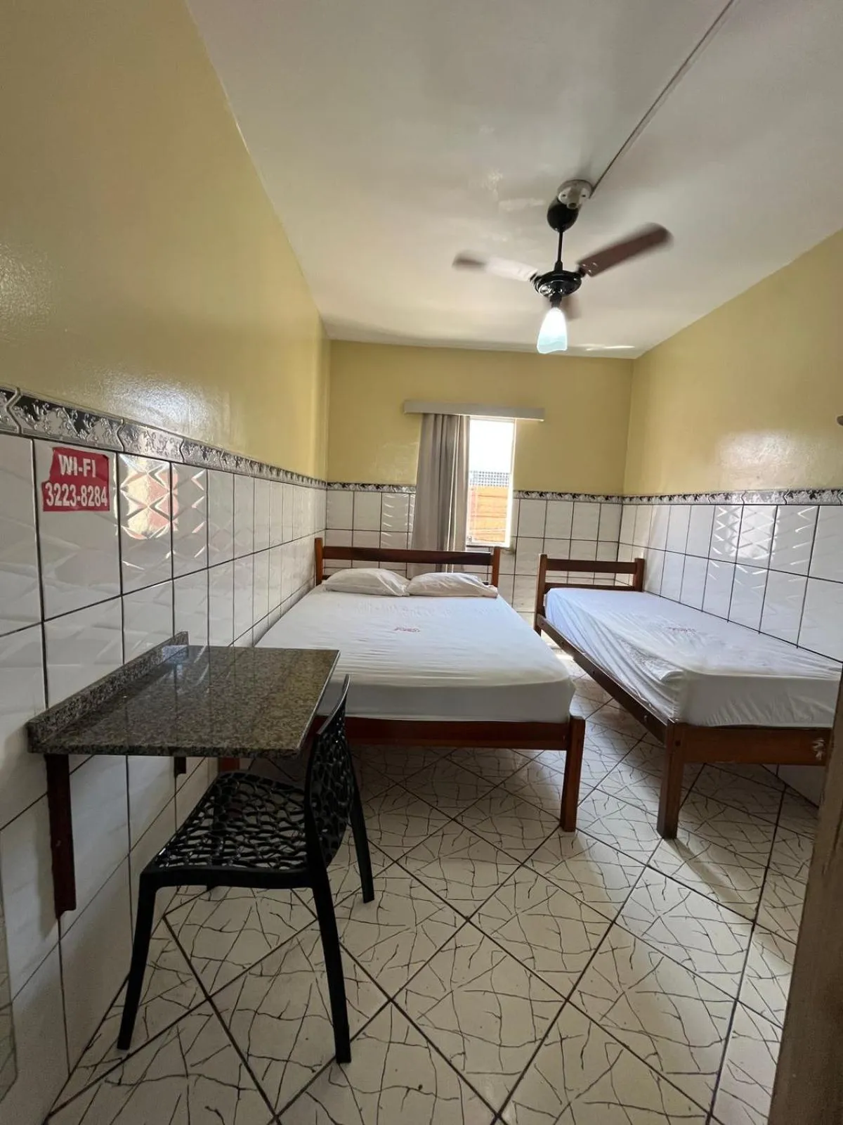 Bed in Pousada Freitas