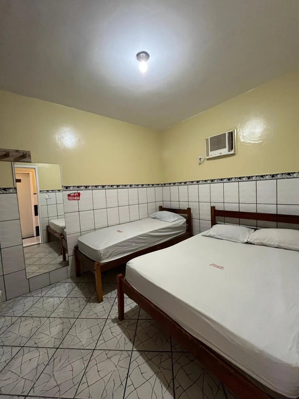 Bed in Pousada Freitas