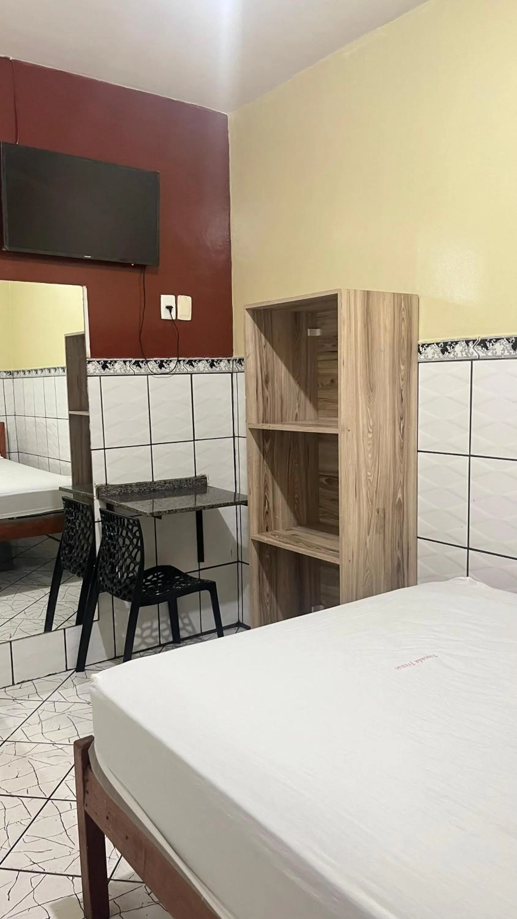Bed in Pousada Freitas