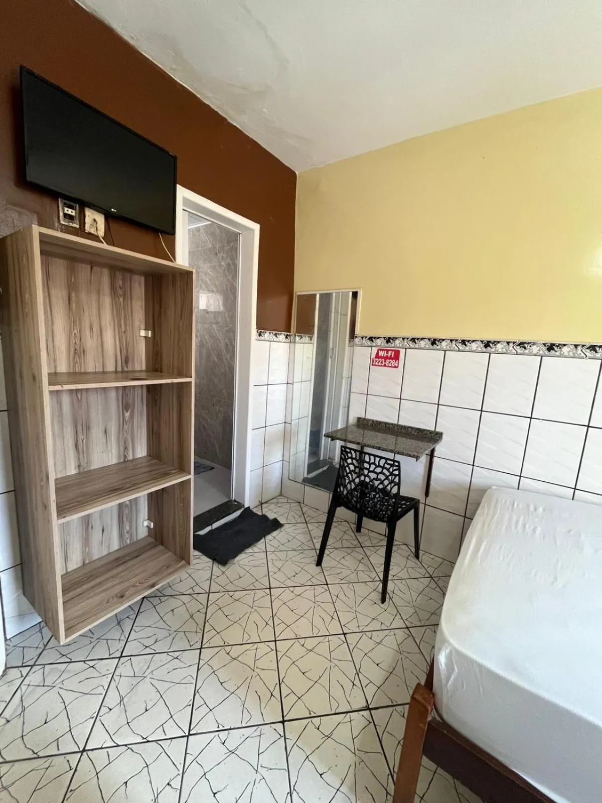 Bed in Pousada Freitas