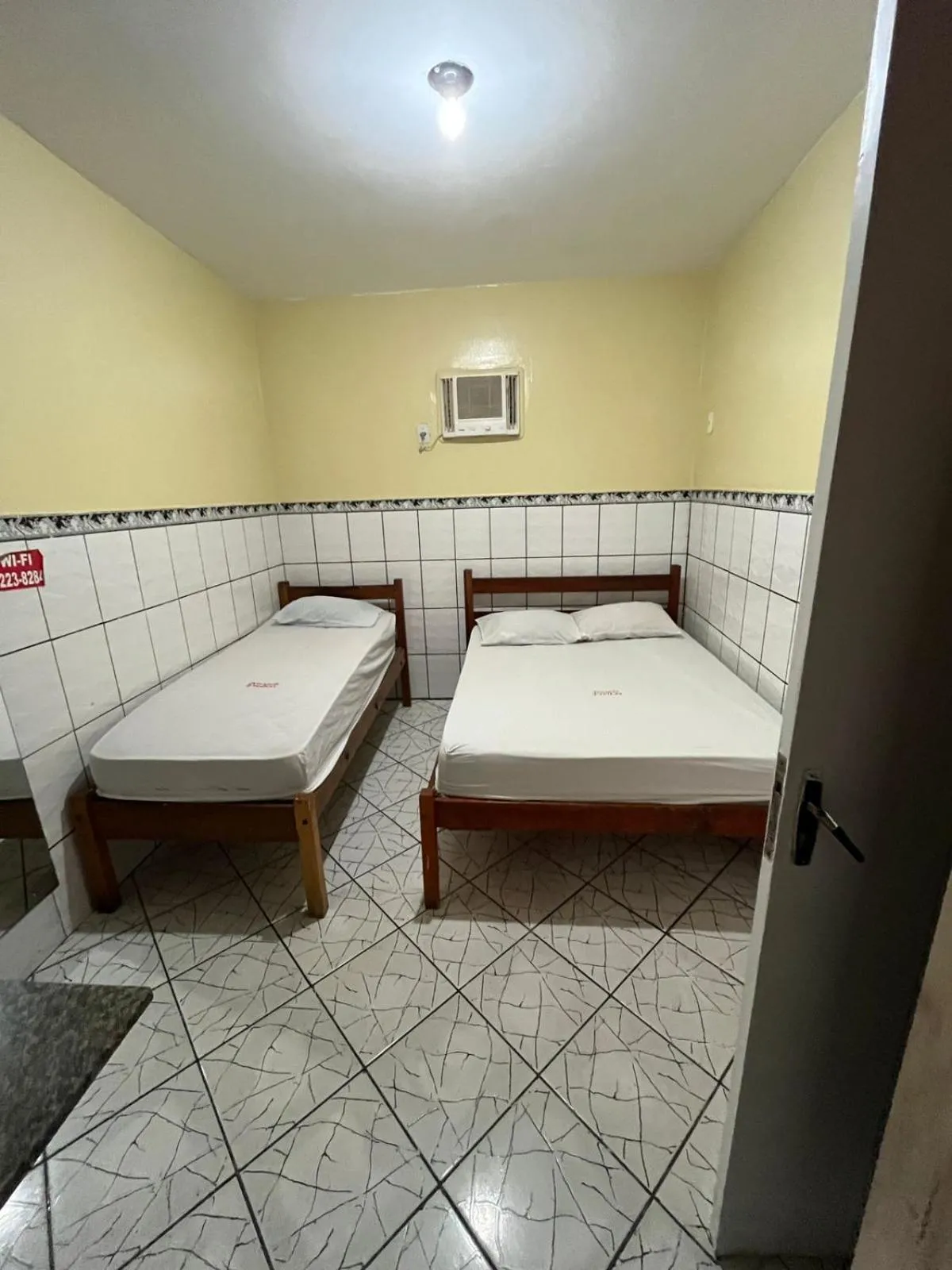 Bed in Pousada Freitas