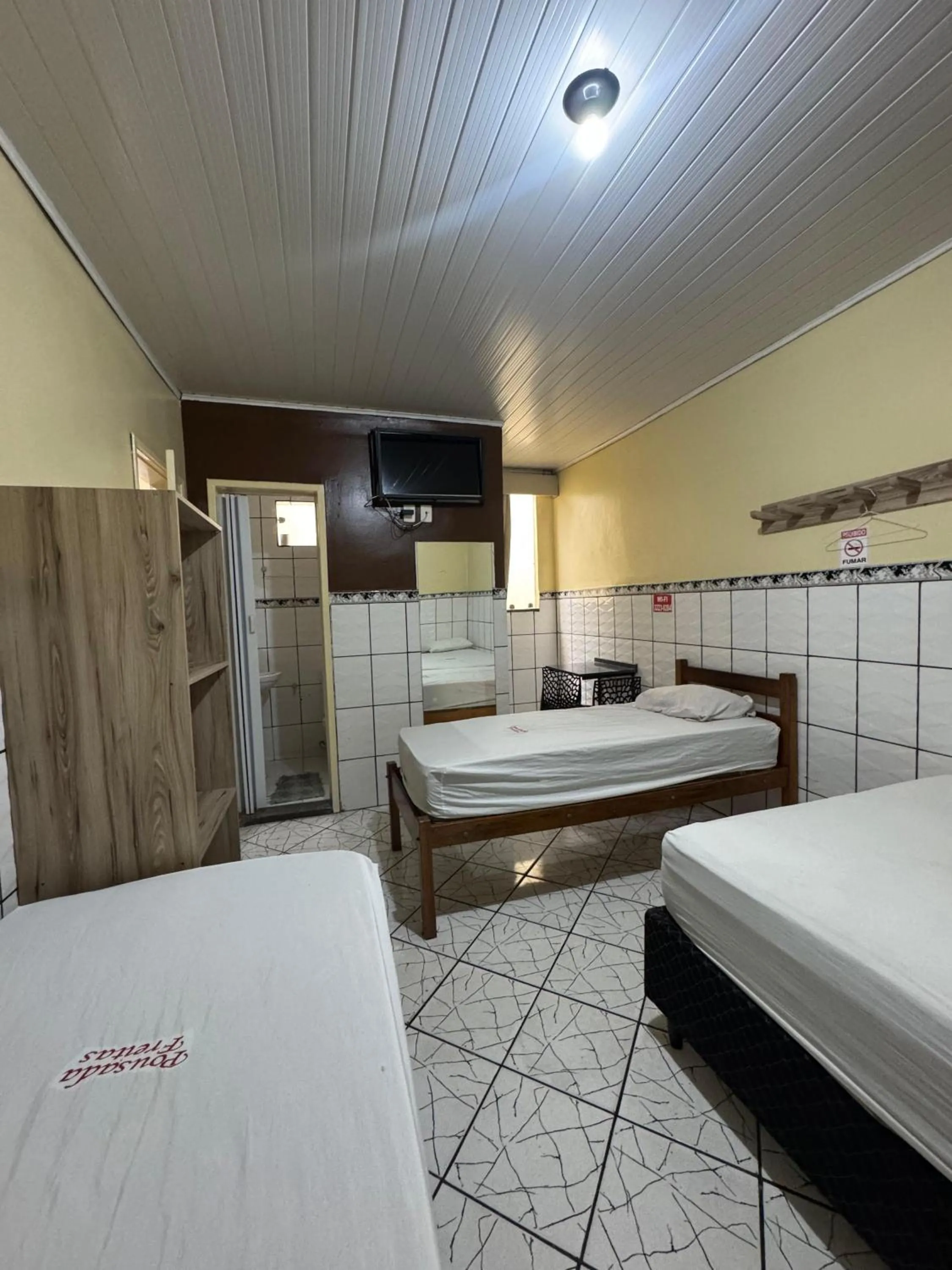 Bed in Pousada Freitas