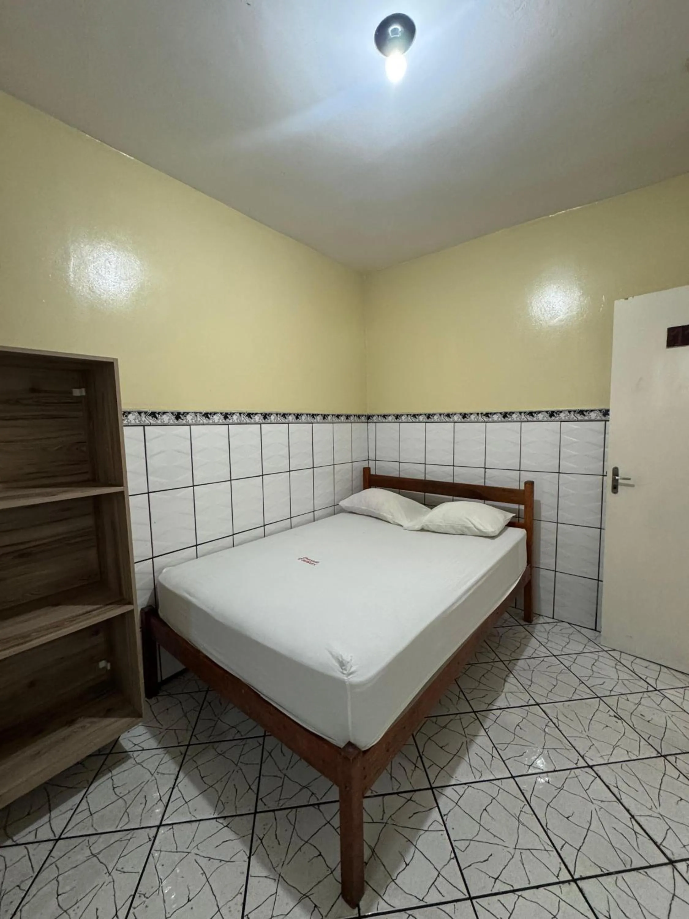 Bed in Pousada Freitas