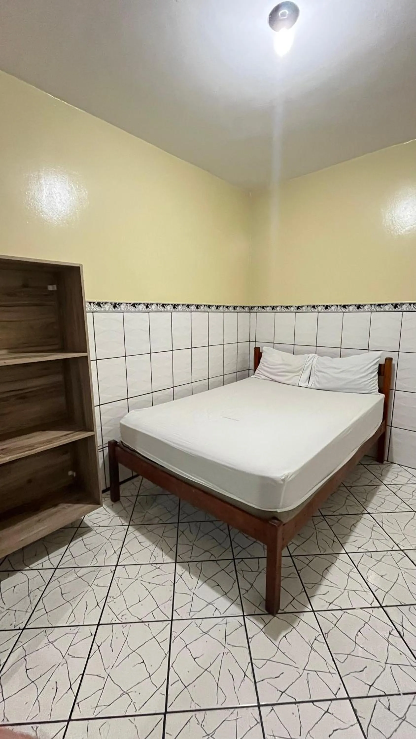 Bed in Pousada Freitas