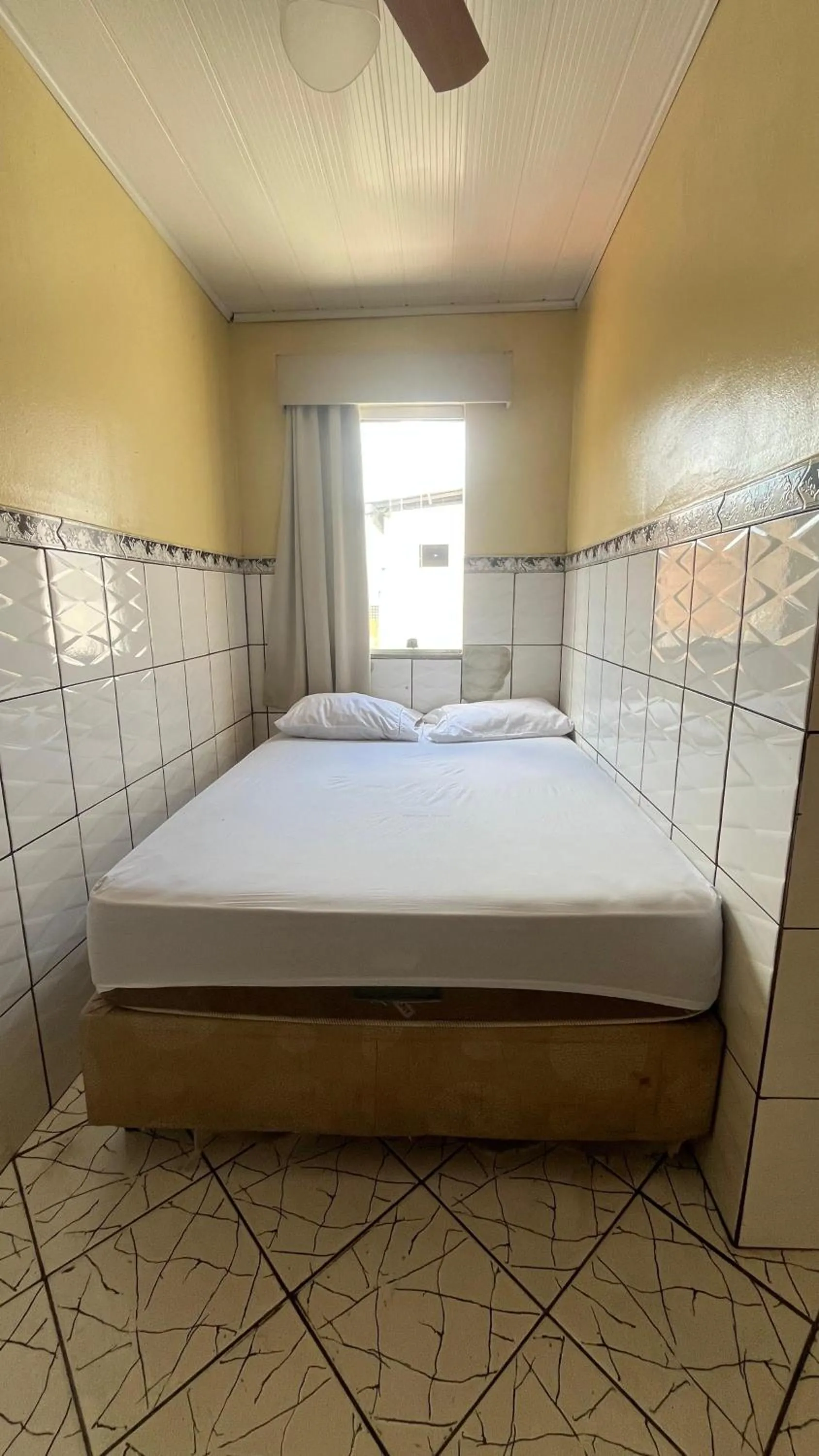 Bed in Pousada Freitas