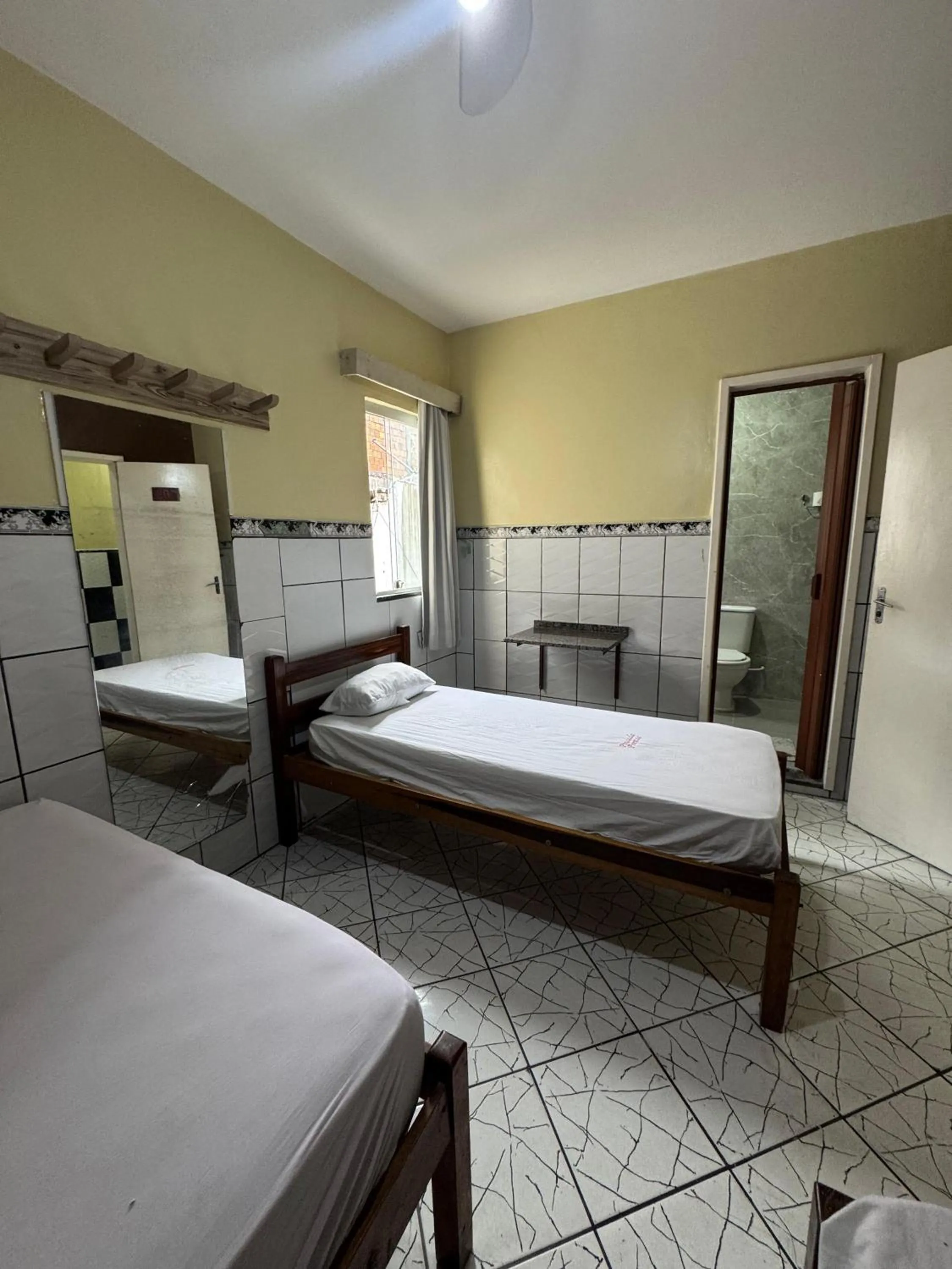 Bed in Pousada Freitas