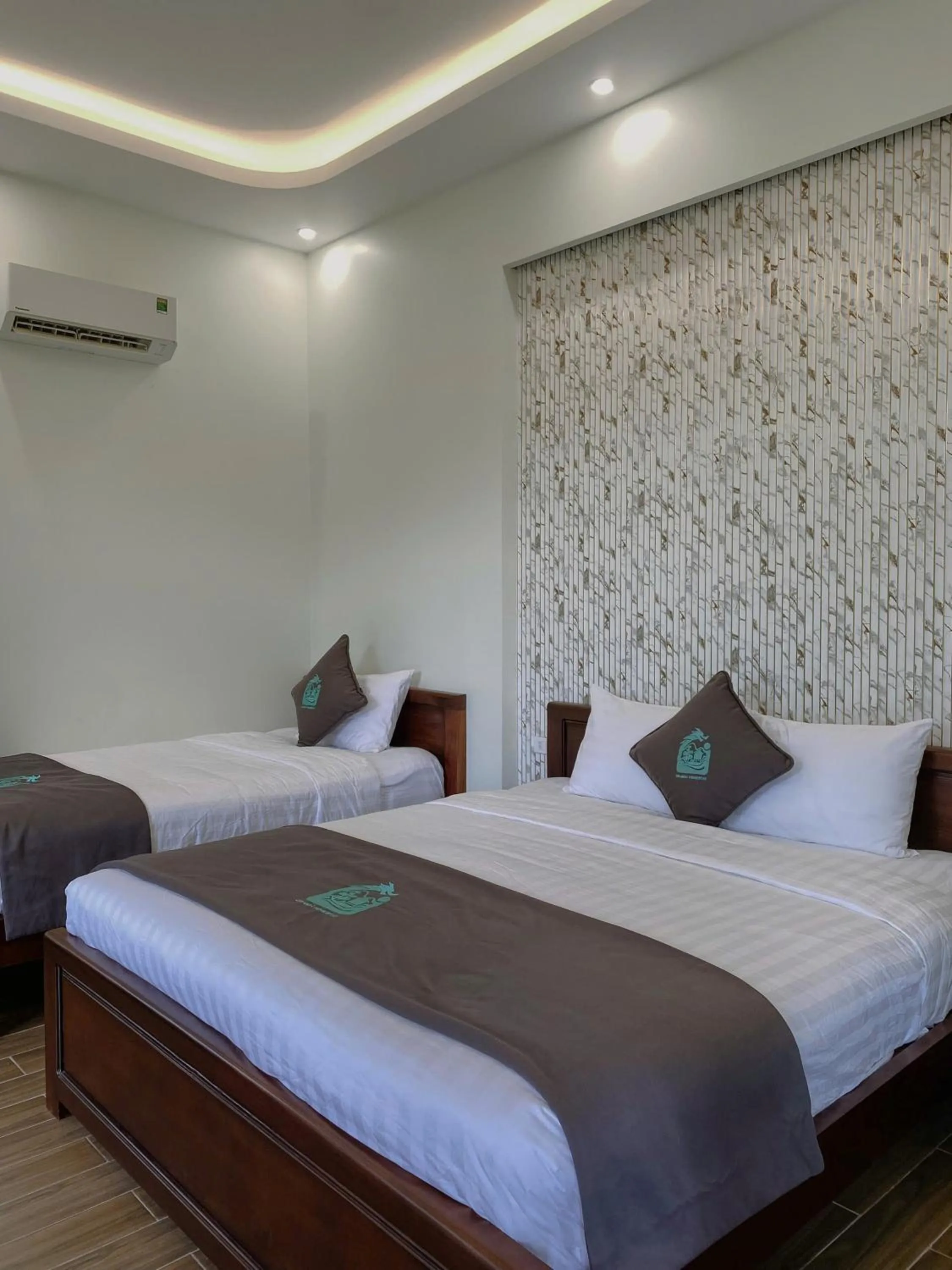 Bed in Homestay Hà Tiên Dragon