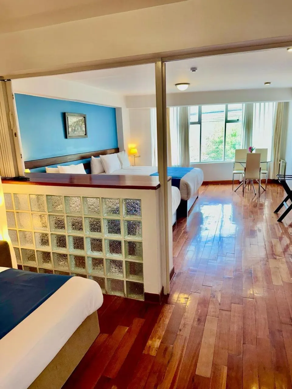 Communal lounge/ TV room, Bed in Wayqey Hotel