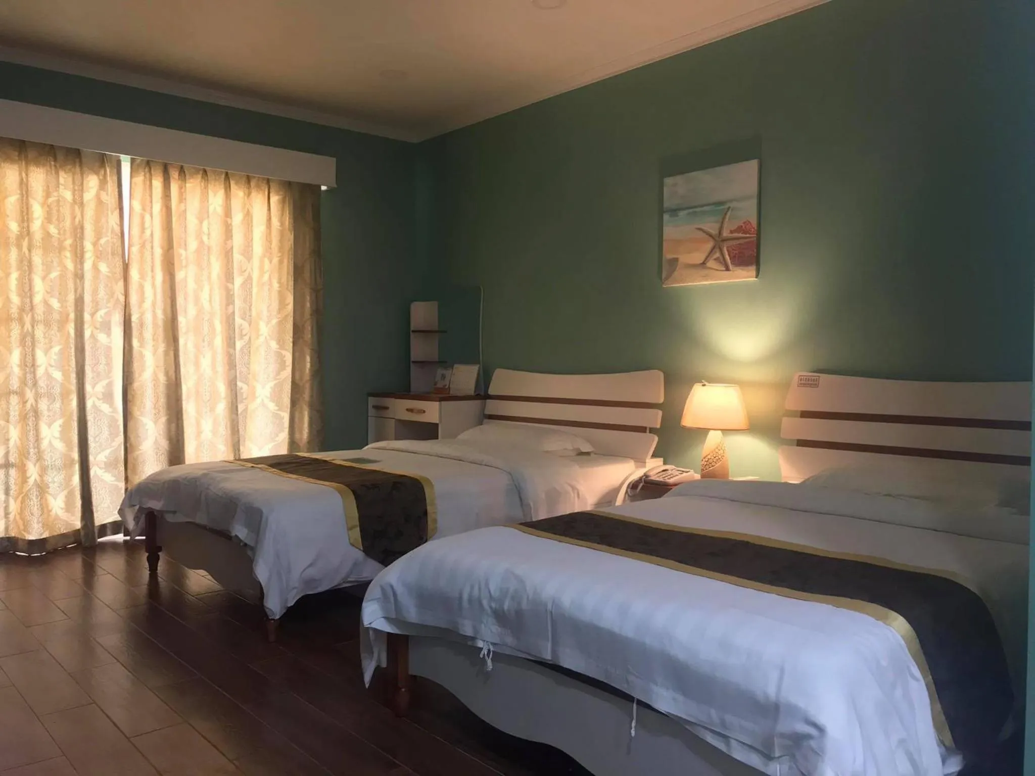 Bed in Beach Garden Hotel