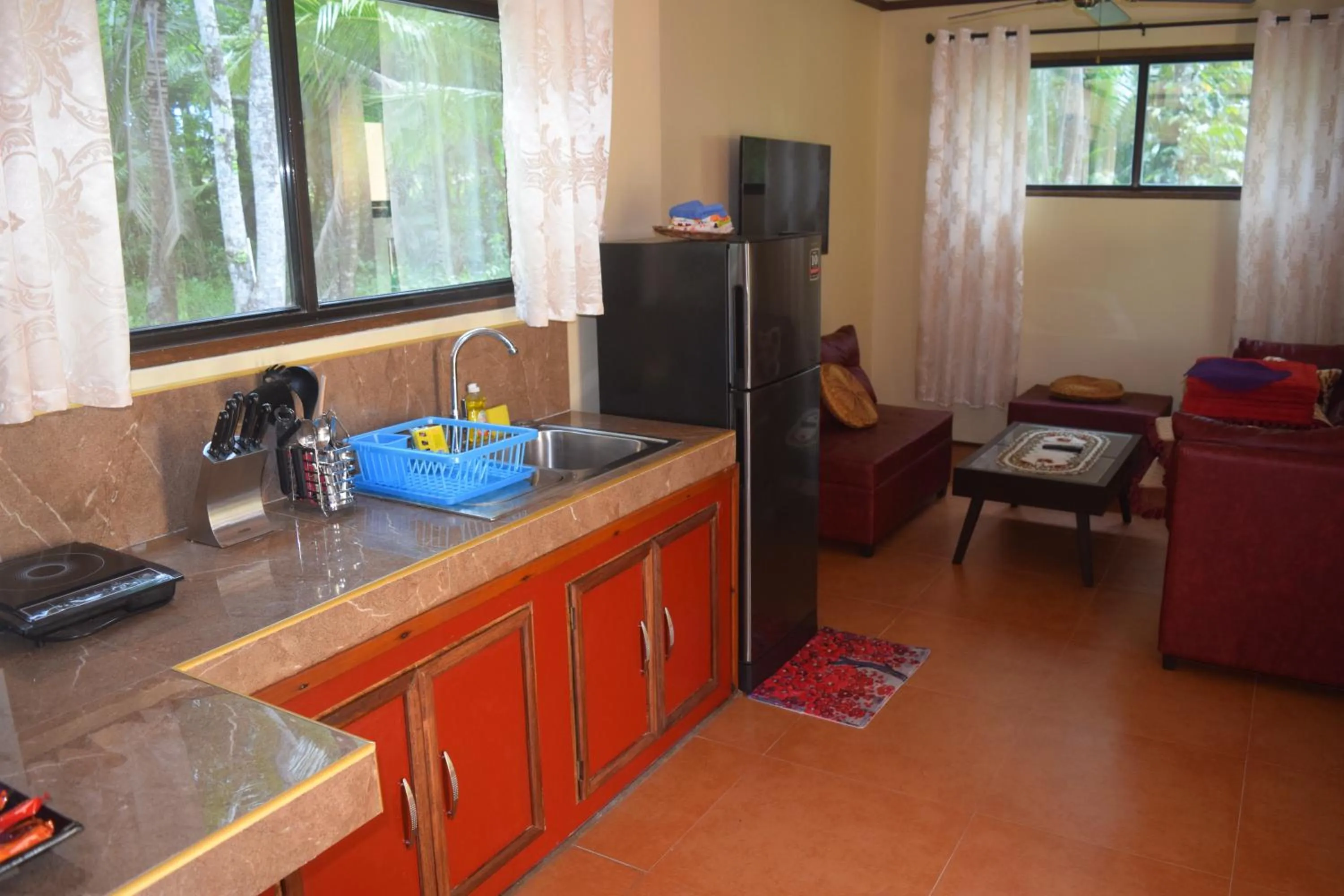 Kitchen or kitchenette in Siargao Sunset Bay Beach Villas