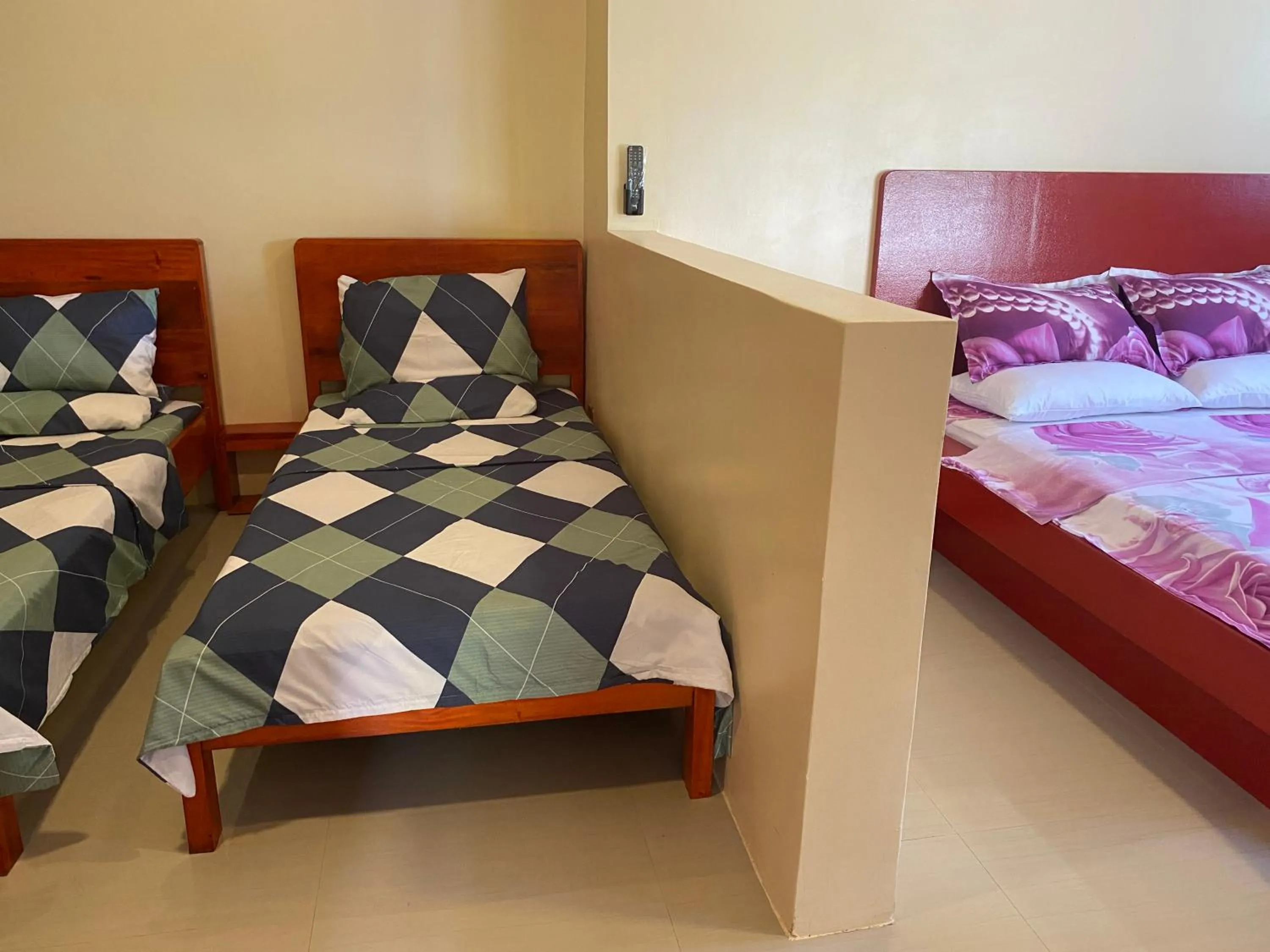 Bed in Siargao Sunset Bay Beach Villas