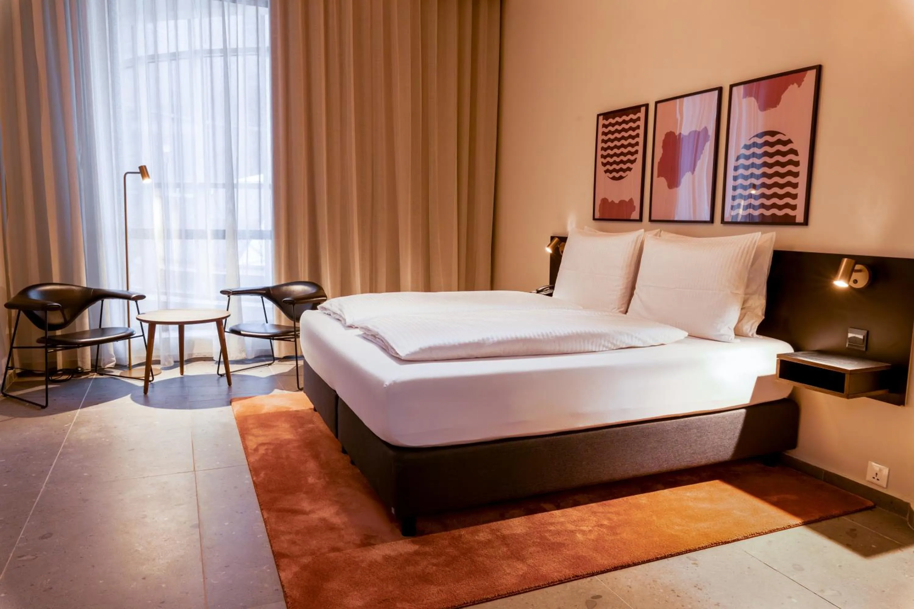 Seating area, Bed in The Nordic Abuja