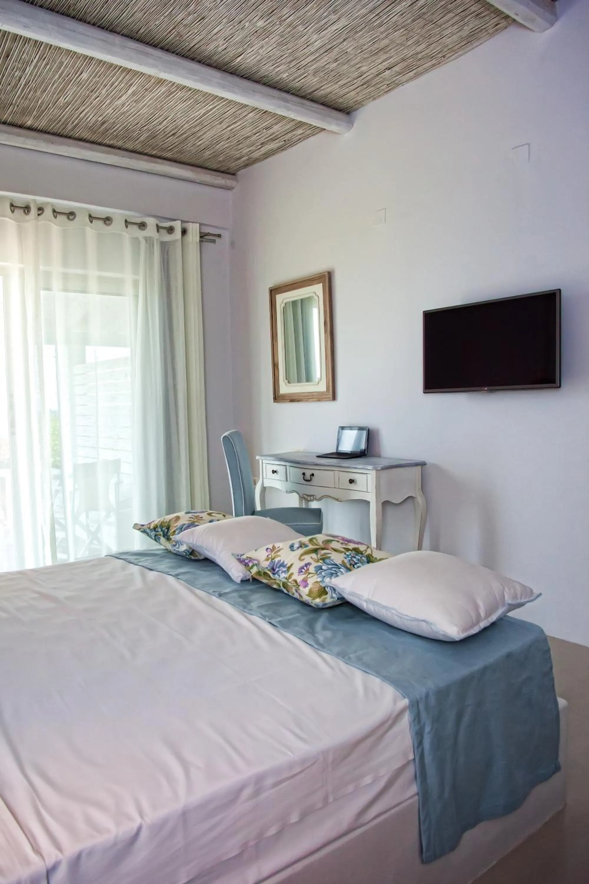 Bed in Artemis Seafront Apartments