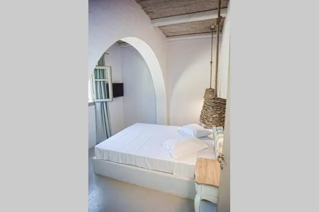 Bed in Artemis Seafront Apartments