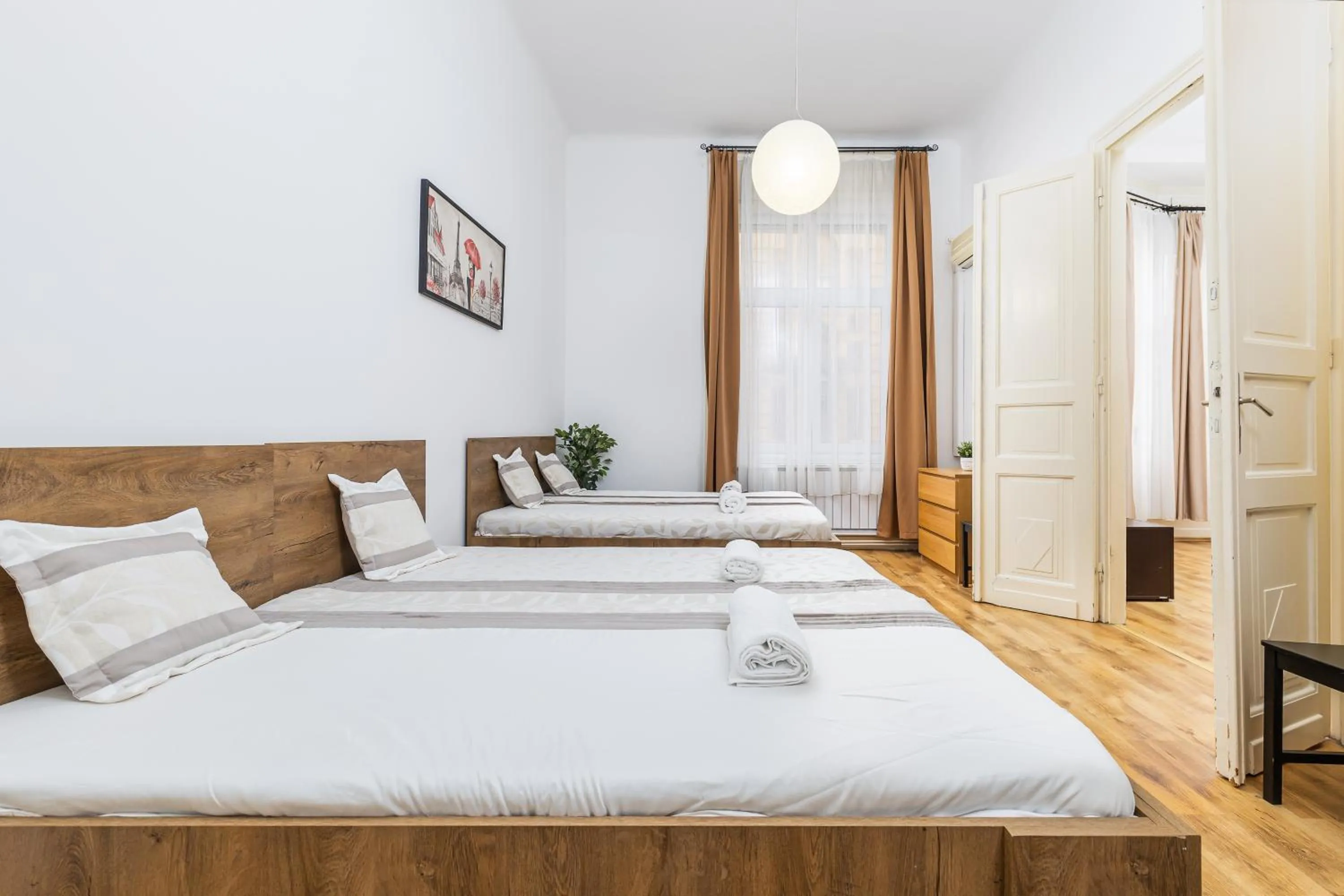 Bed in Real Apartments Lovag