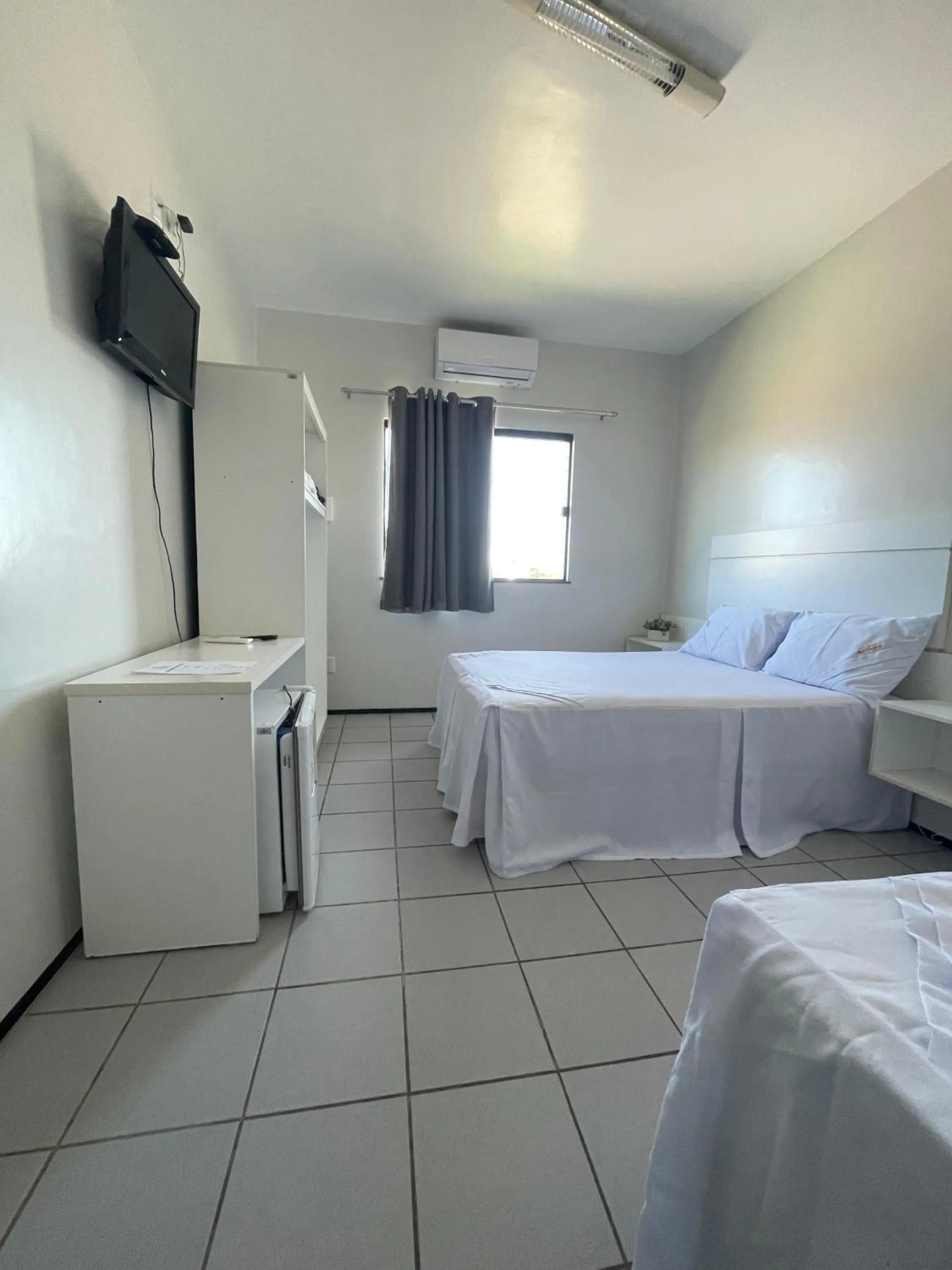 Bed in Pousada Alvorada