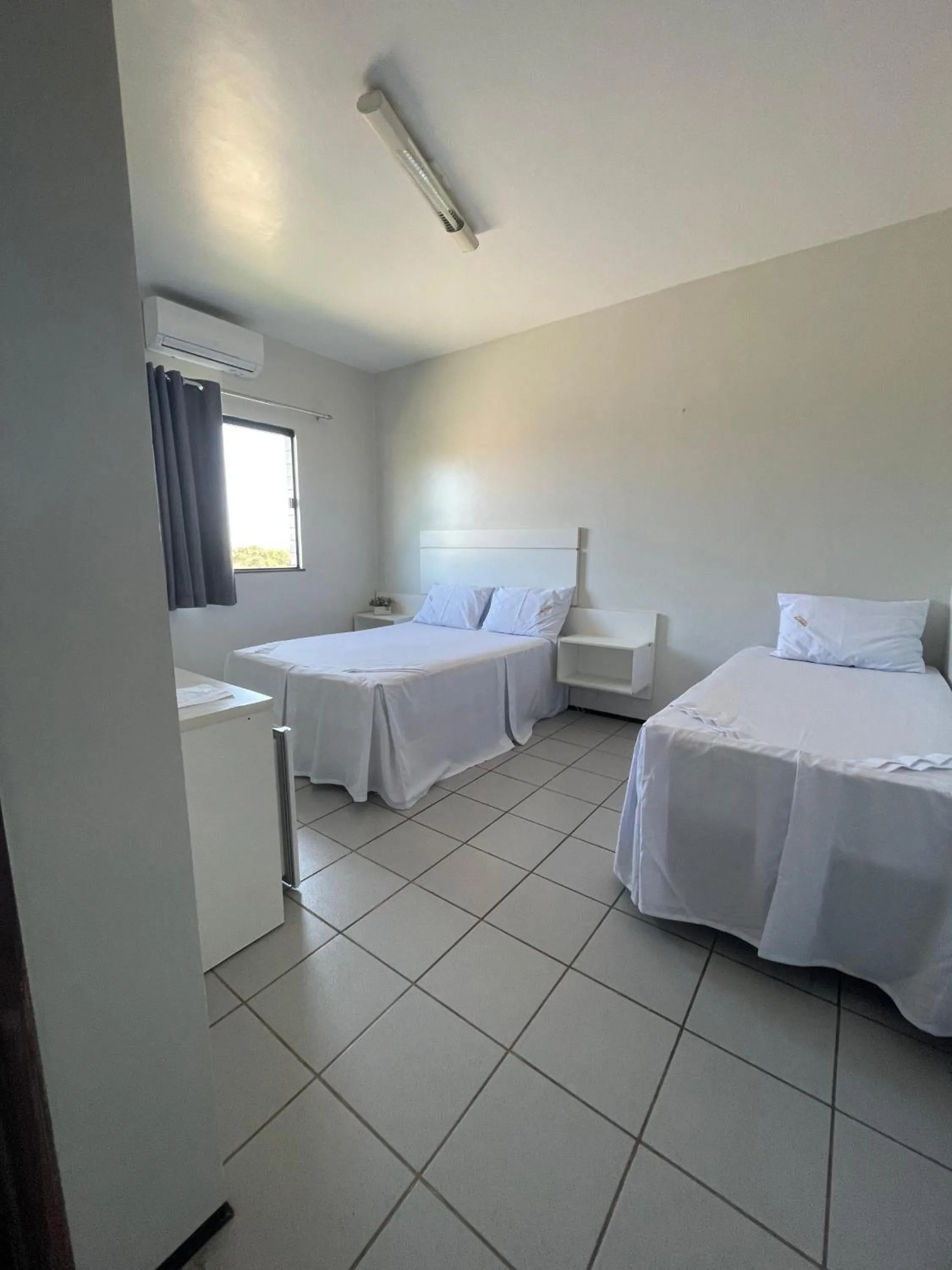 Bed in Pousada Alvorada
