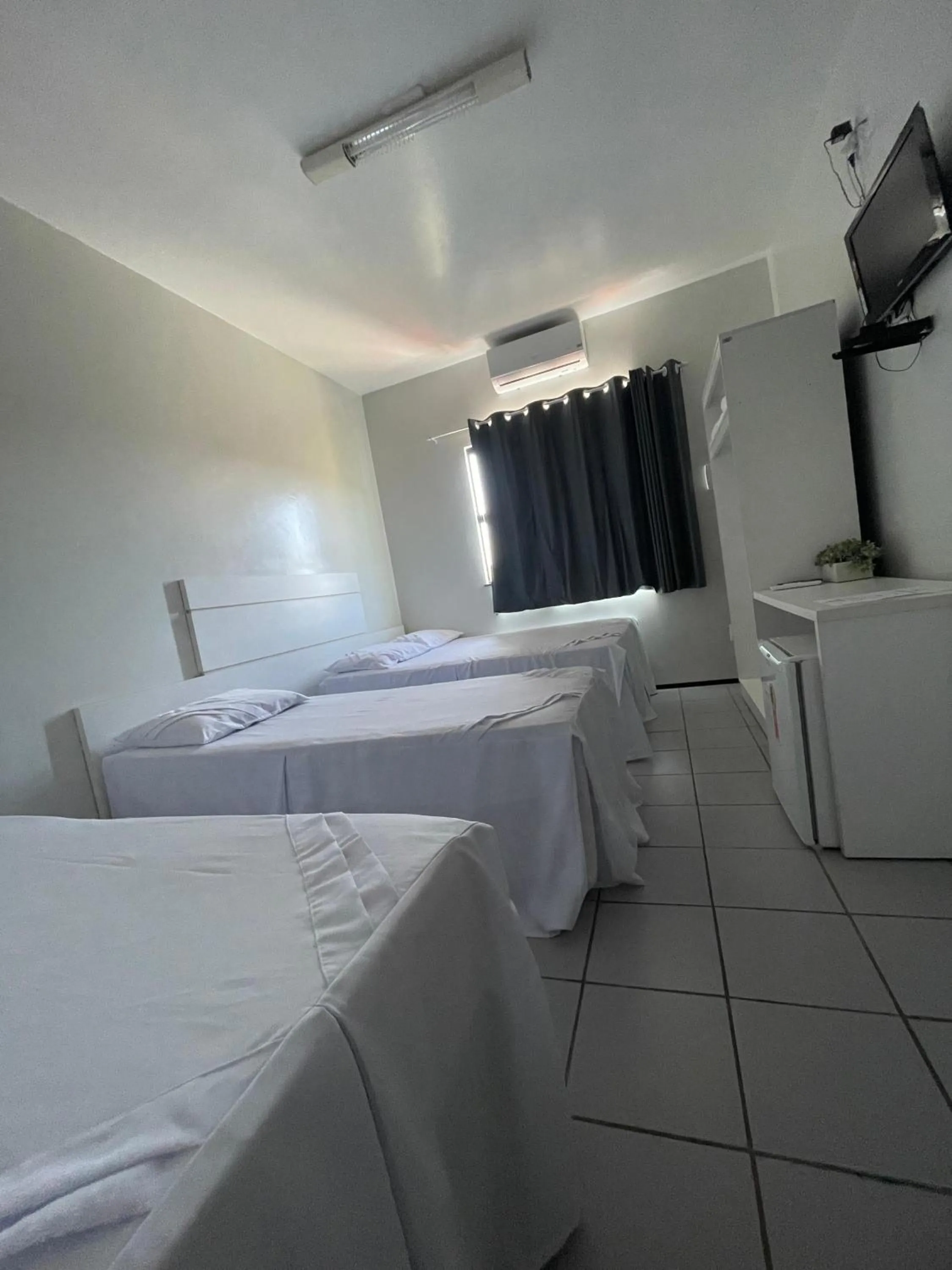 Bed in Pousada Alvorada