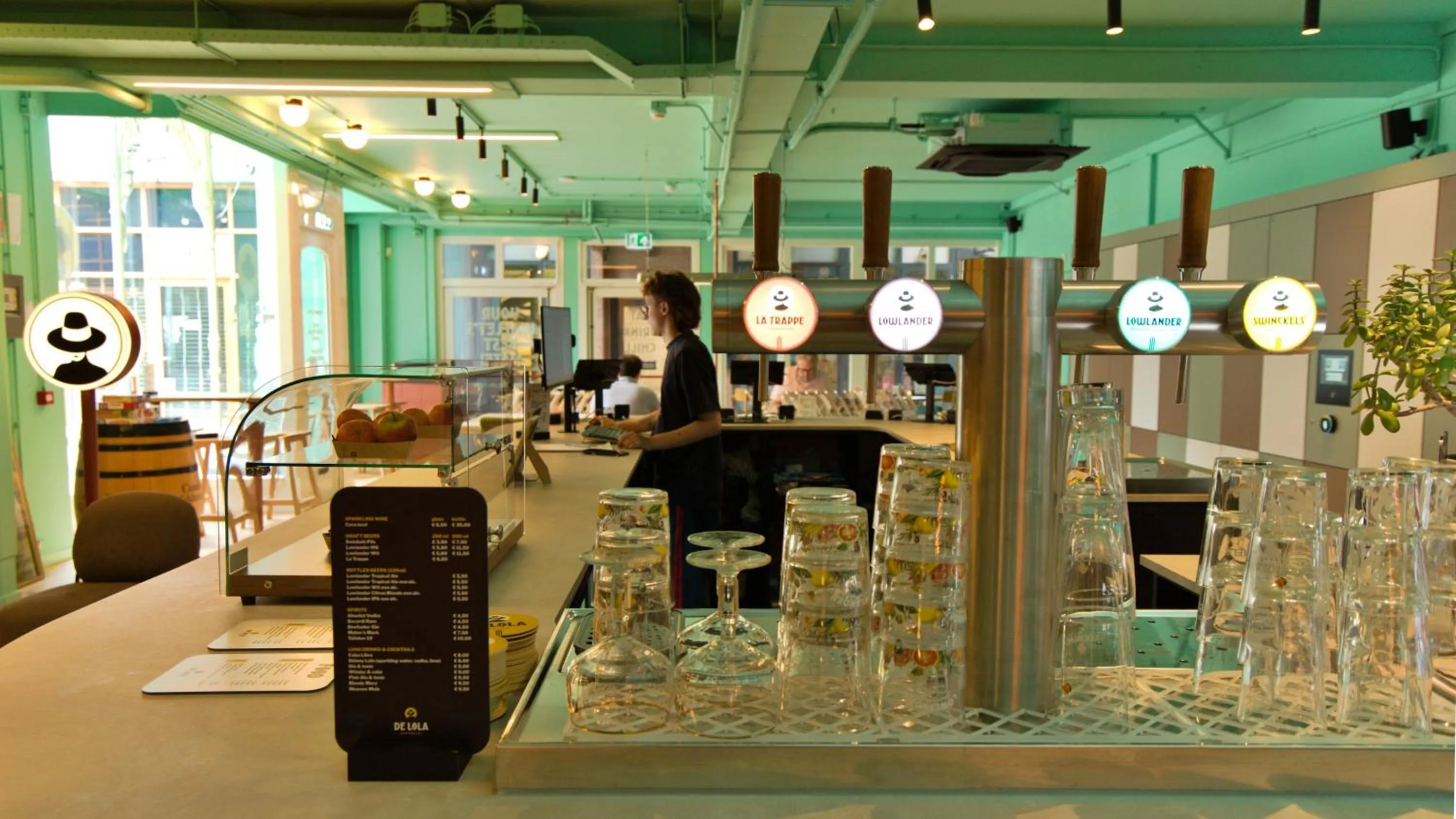 Lounge or bar in De Lola Podshotel