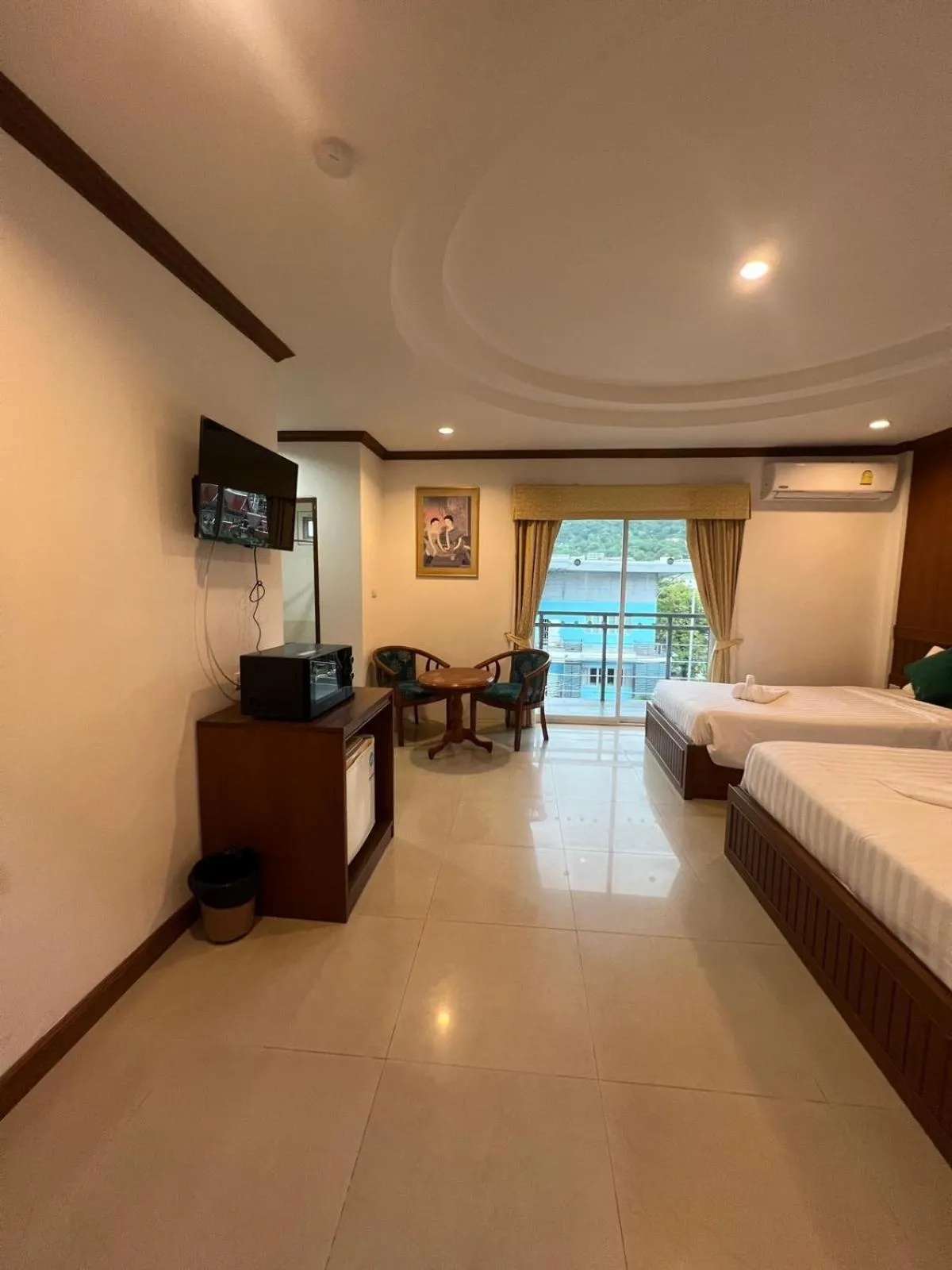 TV and multimedia, Bed in SK Residence And Restaurant Patong