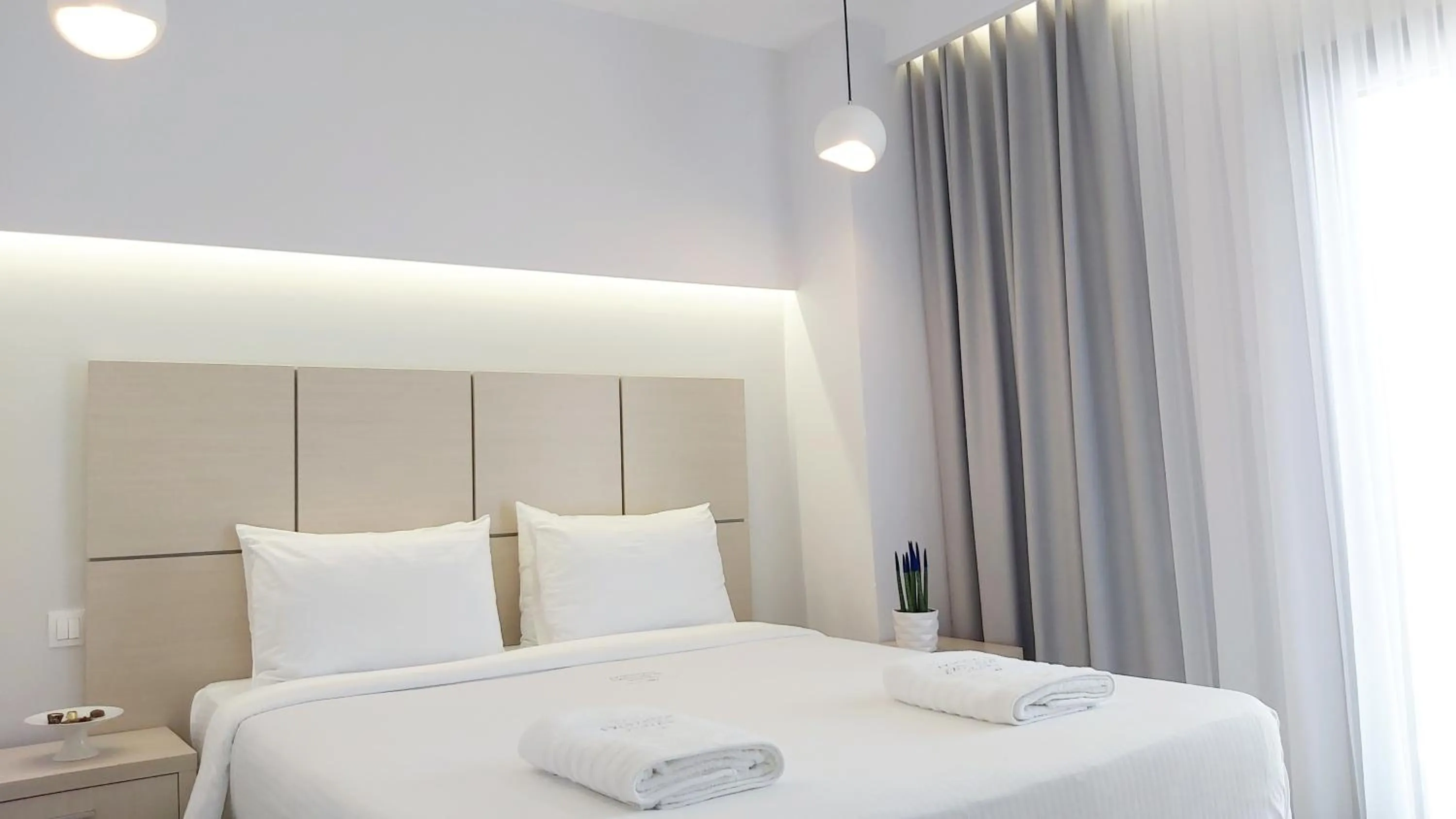 Bed in Akrogiali Exclusive Hotel (Adults Only)