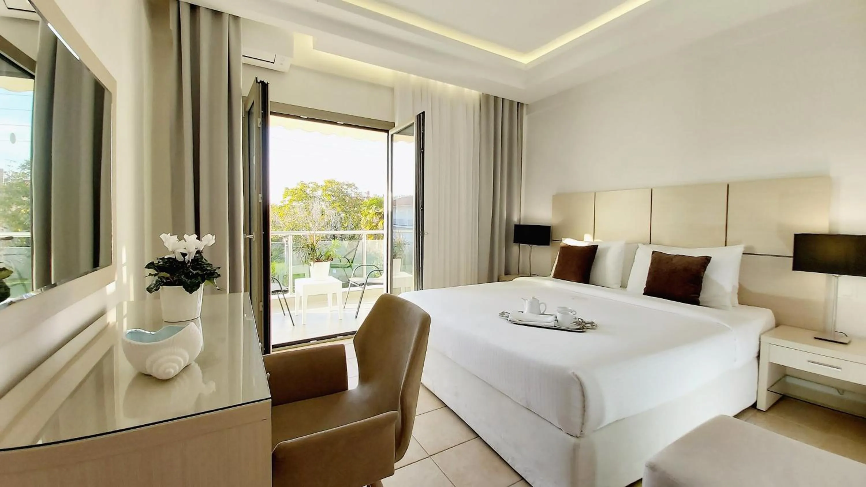 Photo of the whole room, Bed in Akrogiali Exclusive Hotel (Adults Only)