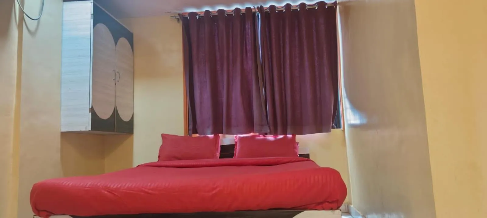 Bed in Hotel Krishna Palace