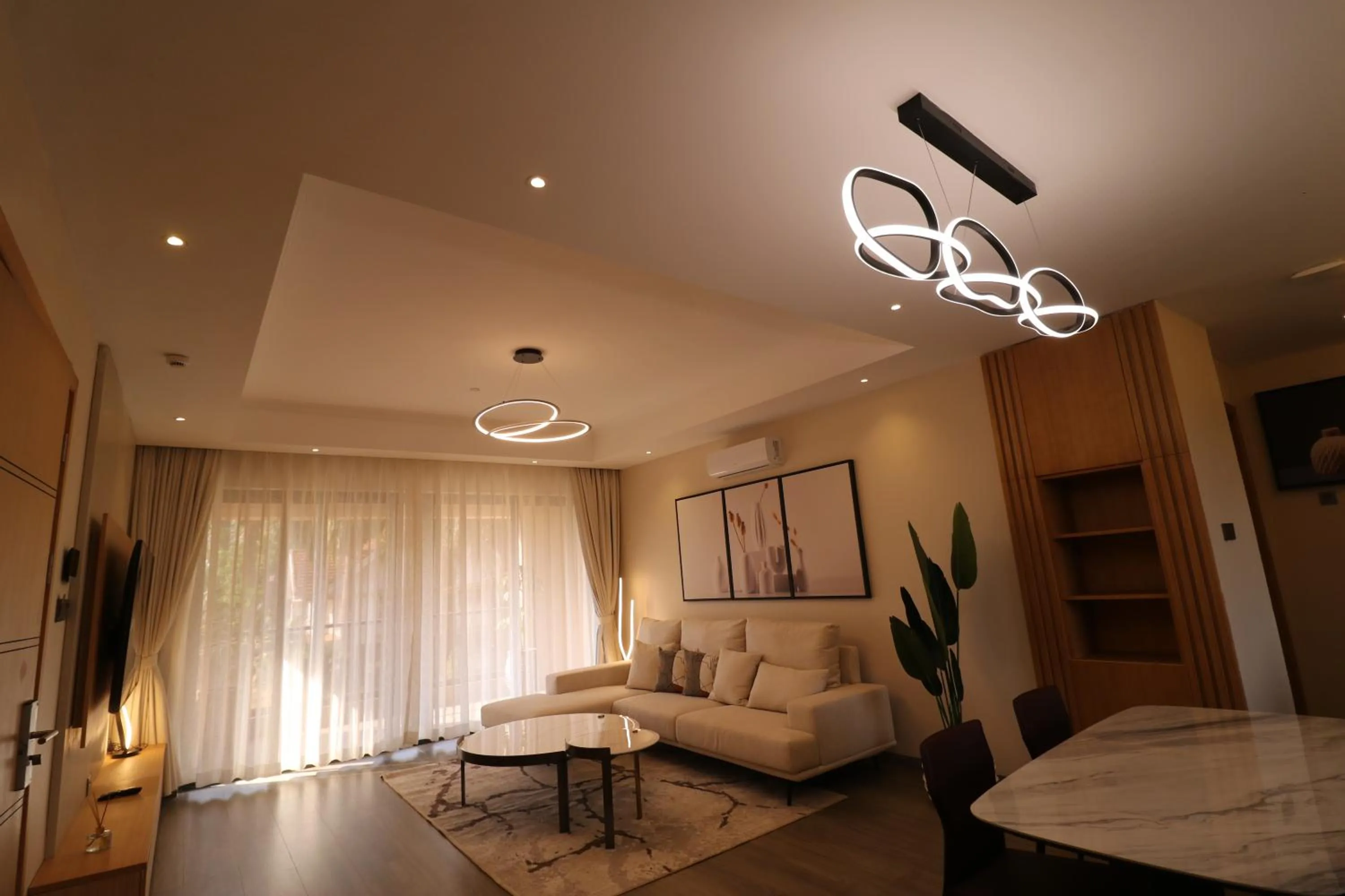 Living room, Bed in Abrish Hotel and Apartment