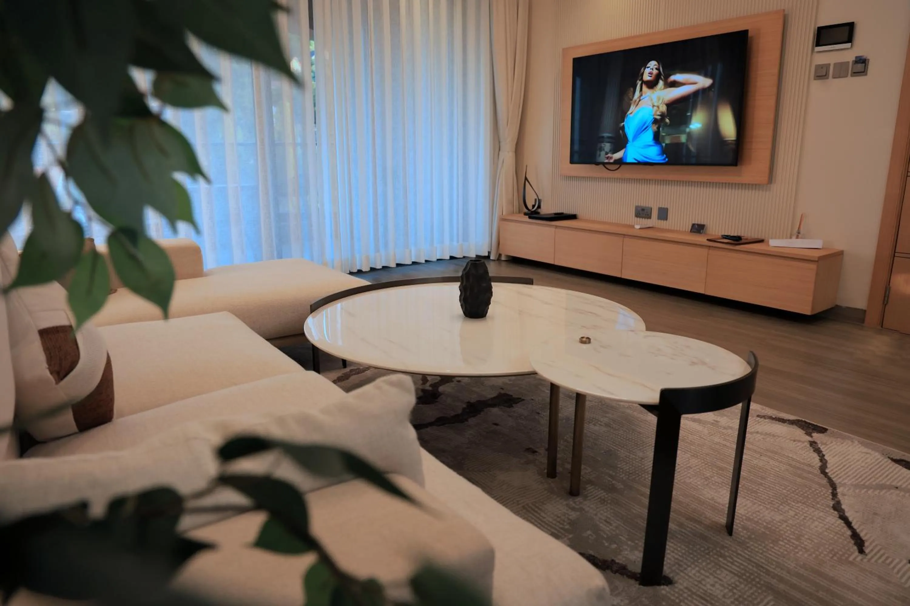 Communal lounge/ TV room in Abrish Hotel and Apartment