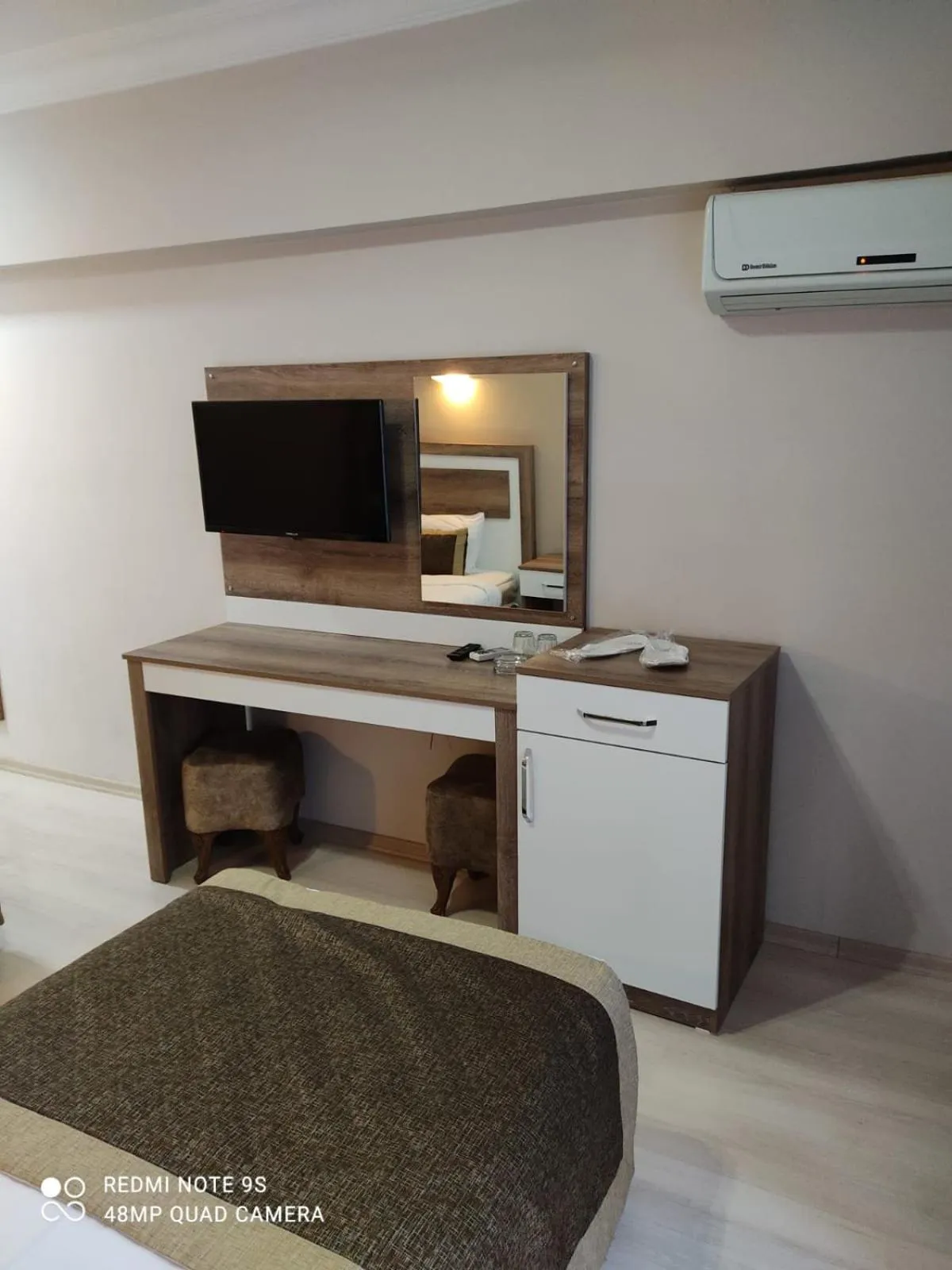 TV and multimedia, Bed in Dempa Hotel