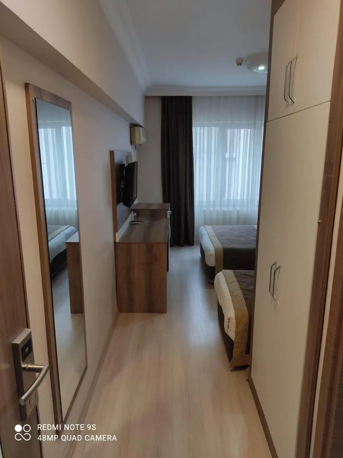 Seating area, Bed in Dempa Hotel Seating area, Bed in Dempa Hotel