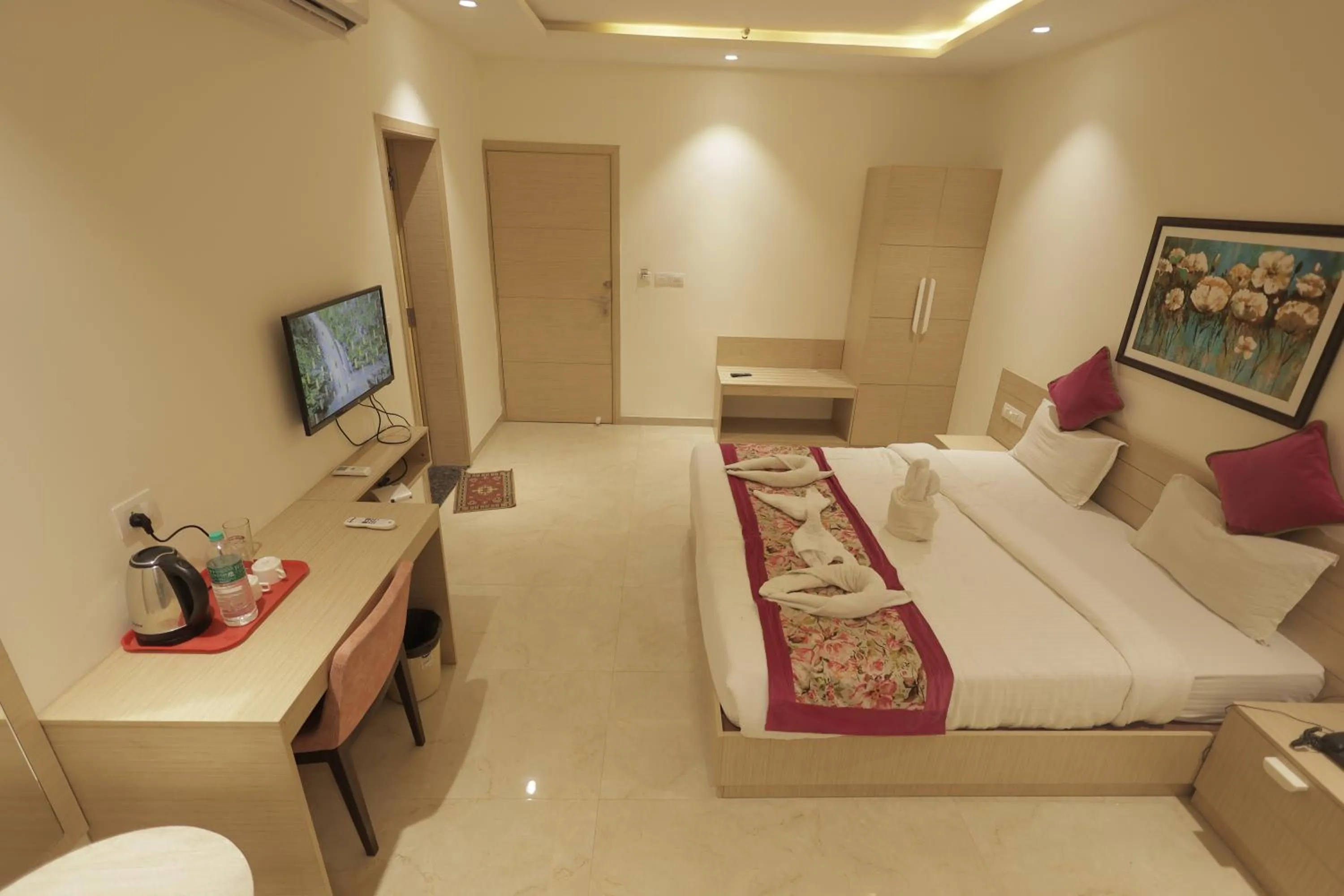 Bed in Hotel Grand Vasaante