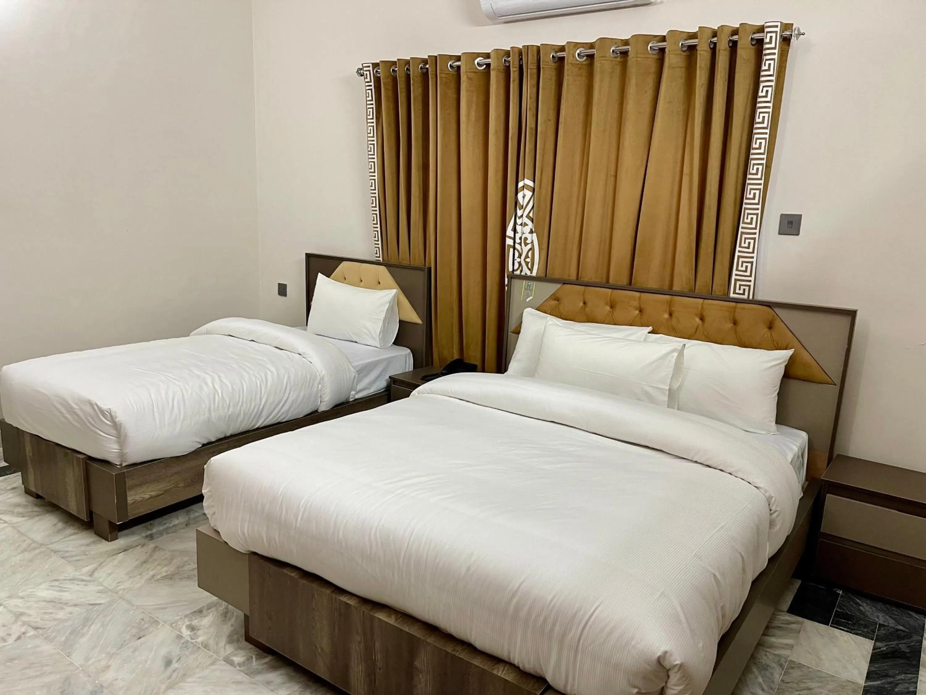 Bed in Landmark Guest House