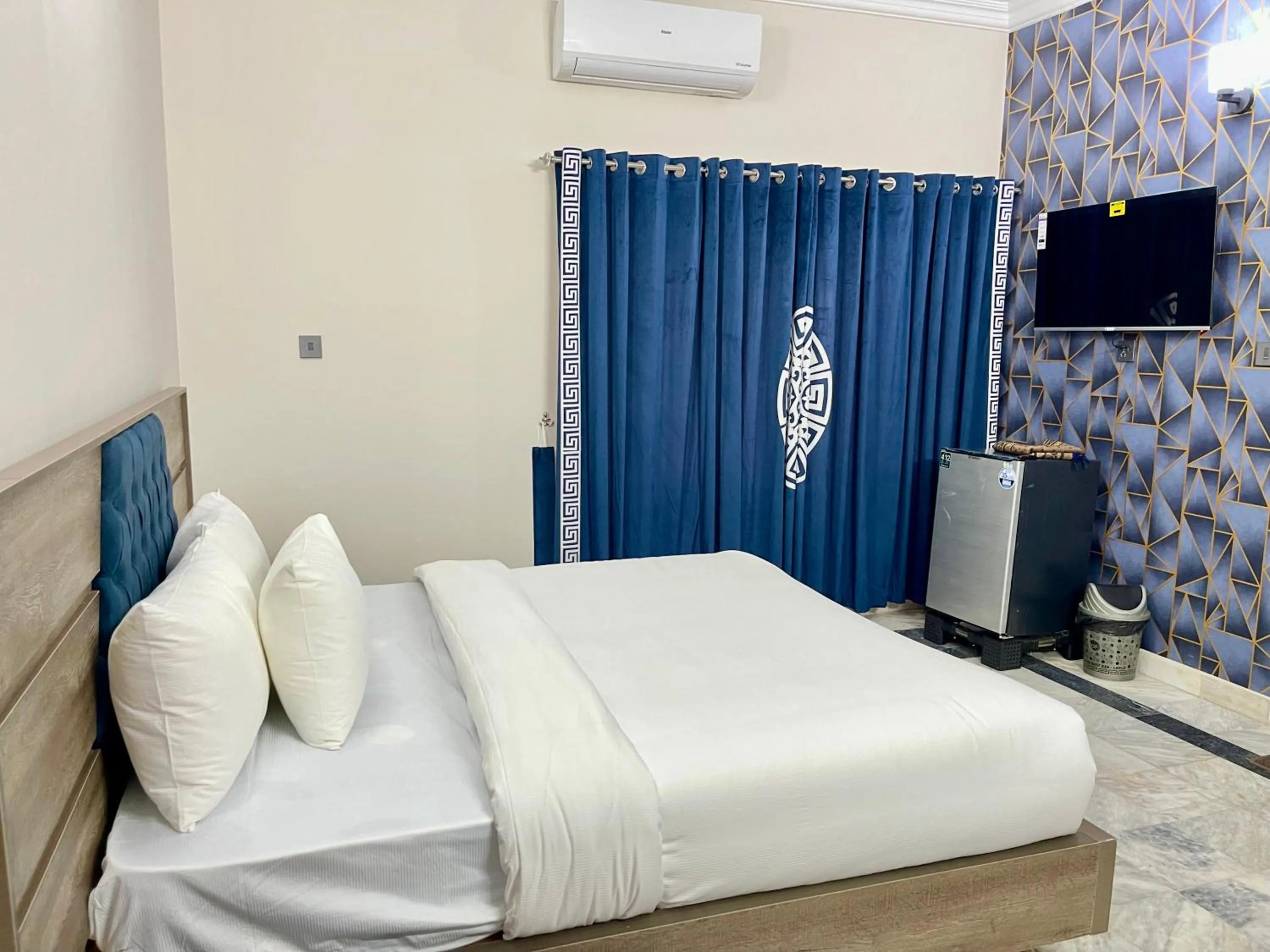 Bed in Landmark Guest House