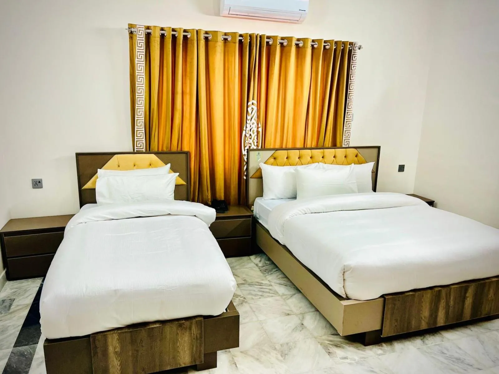Bed in Landmark Guest House