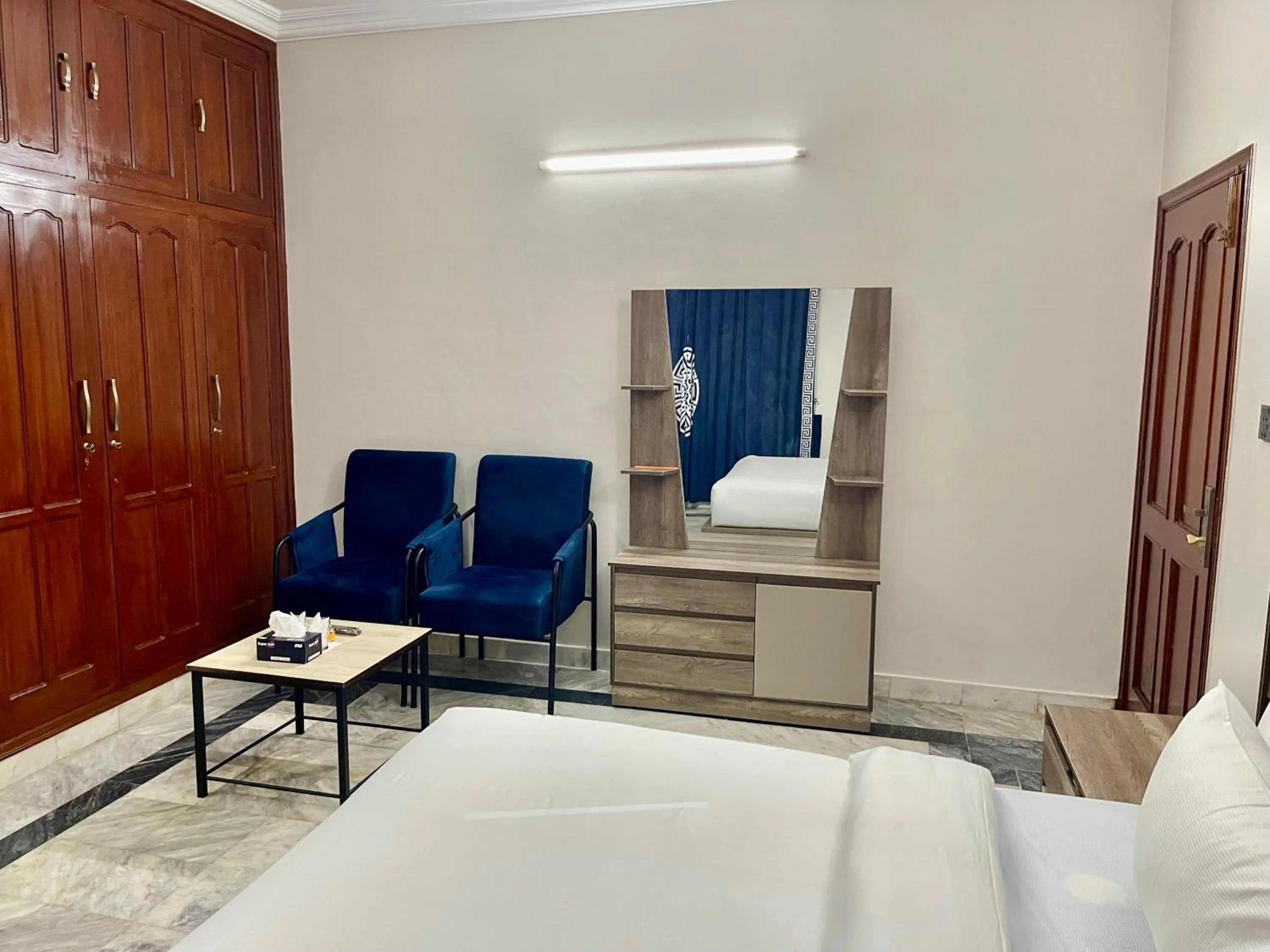 Bed in Landmark Guest House
