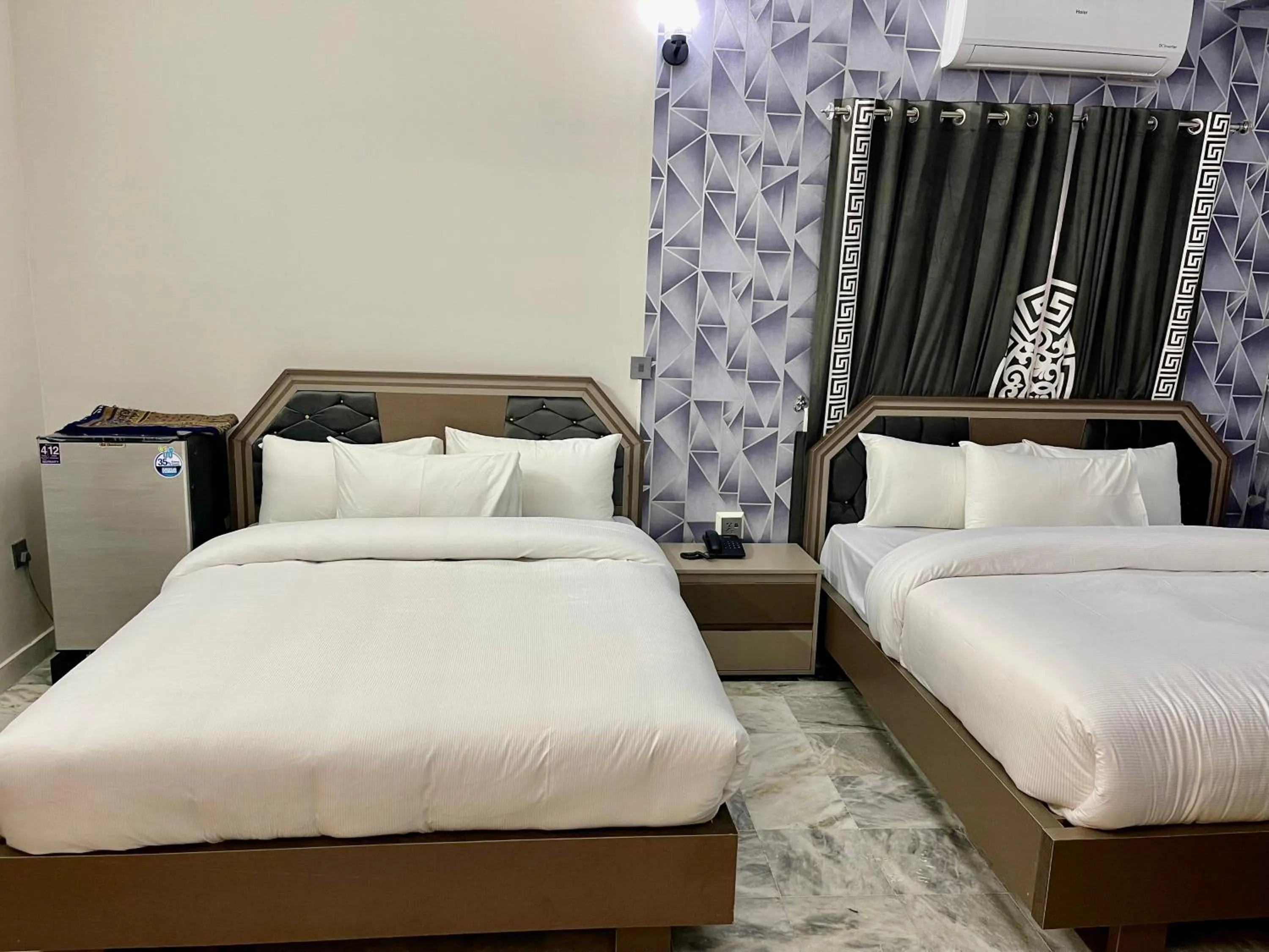 Bed in Landmark Guest House