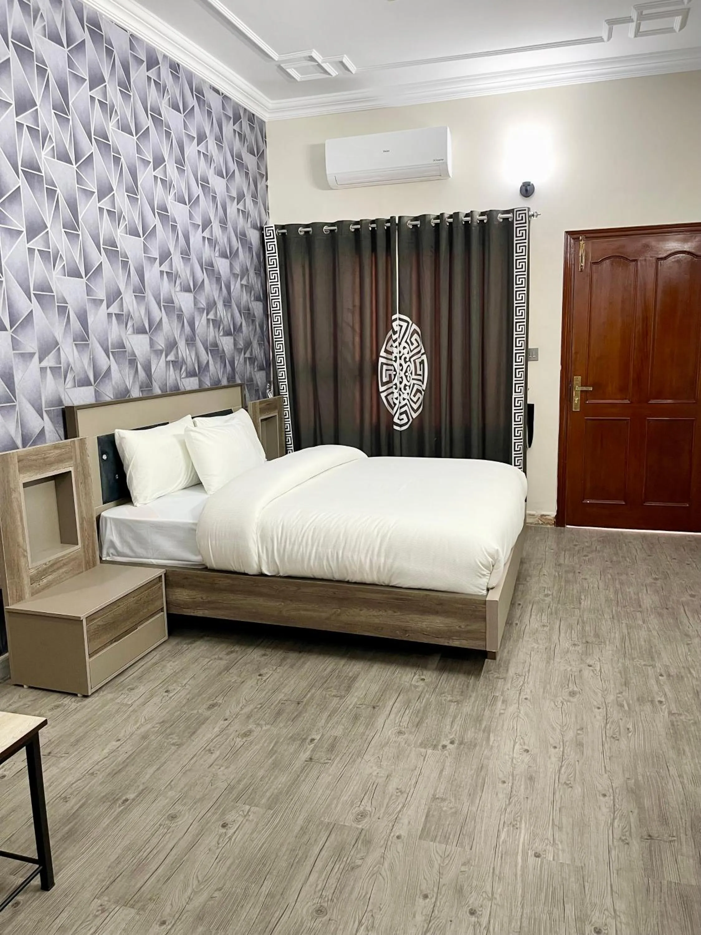 Bed in Landmark Guest House