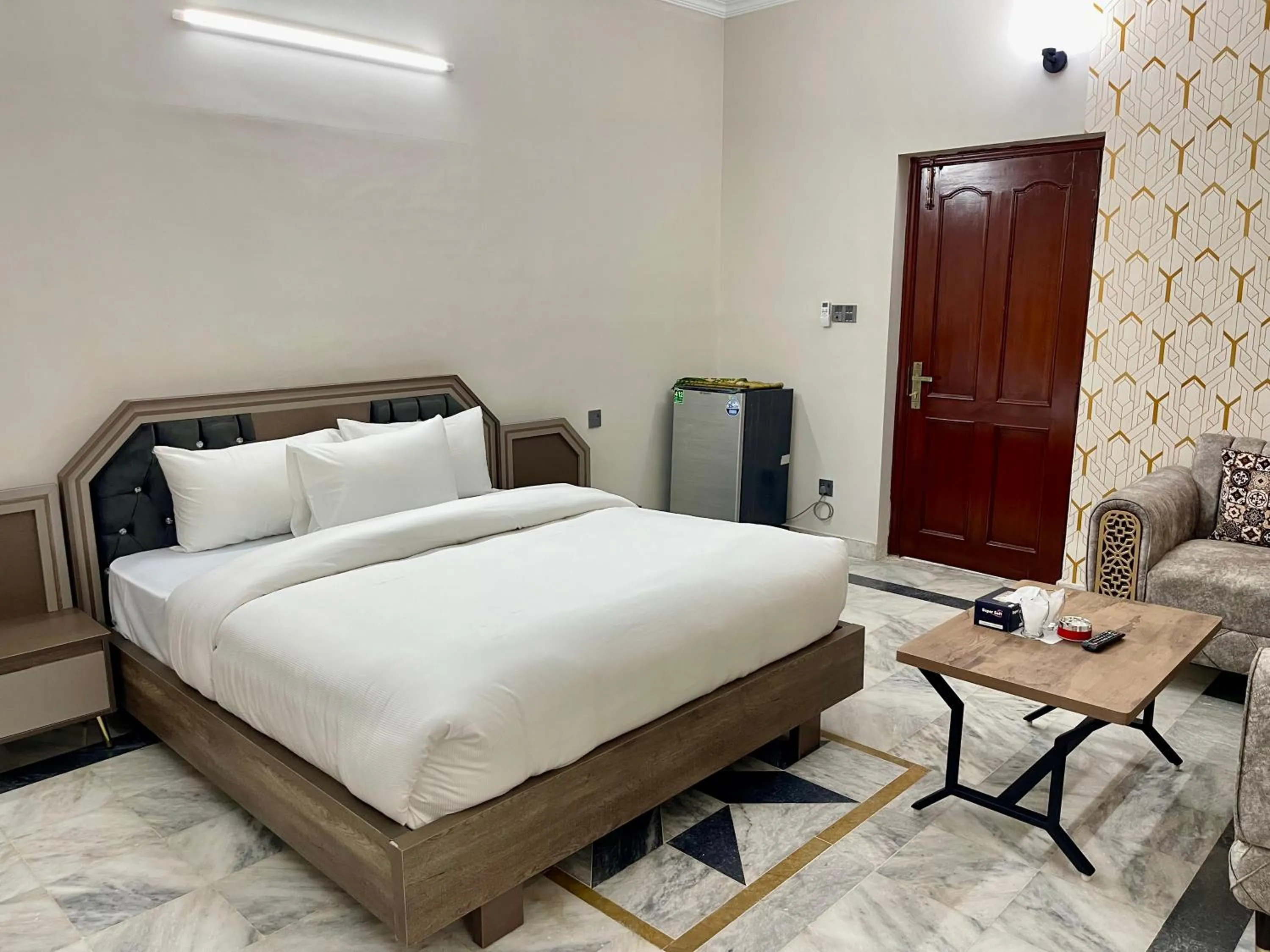Bed in Landmark Guest House