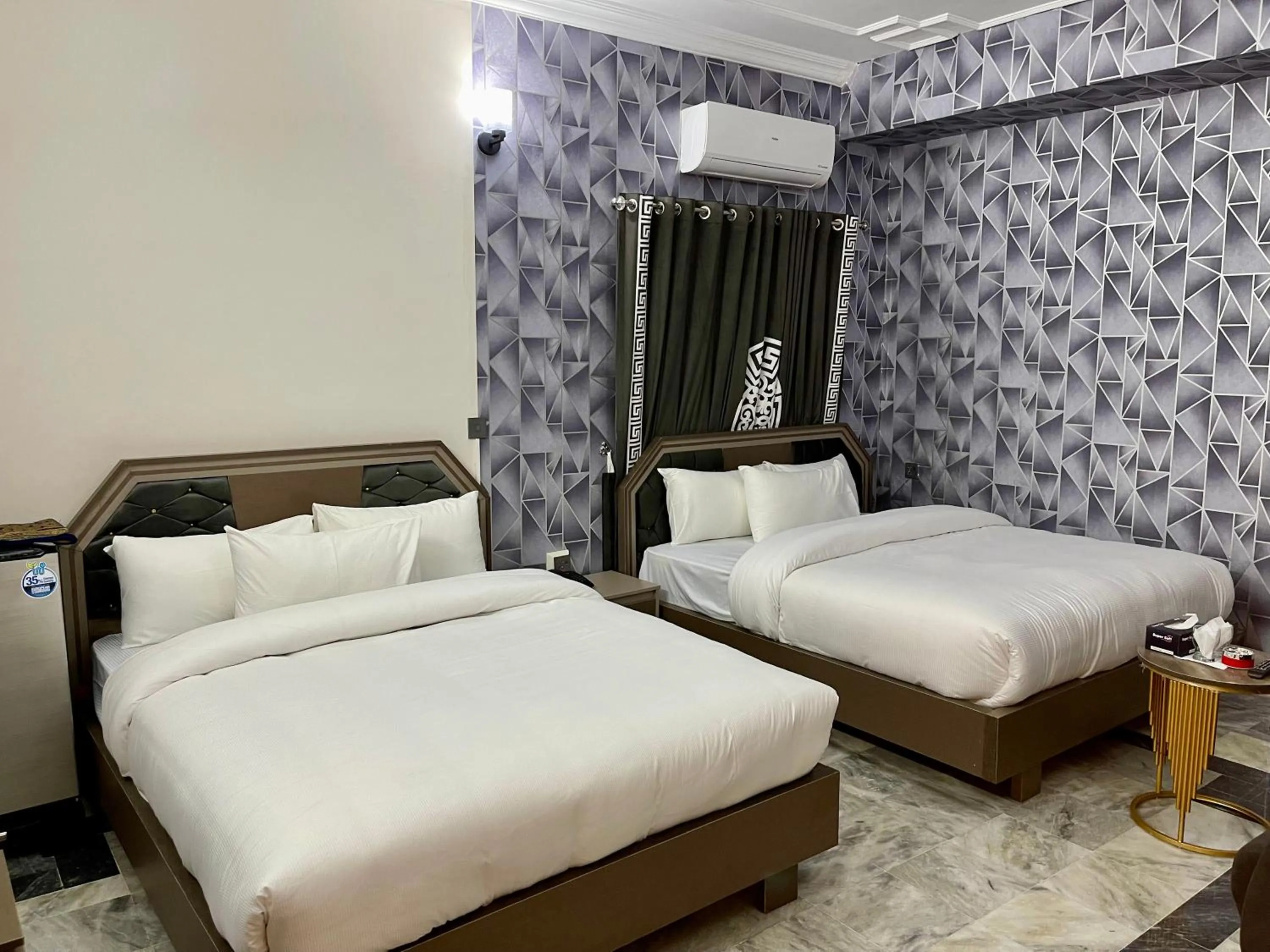 Bed in Landmark Guest House