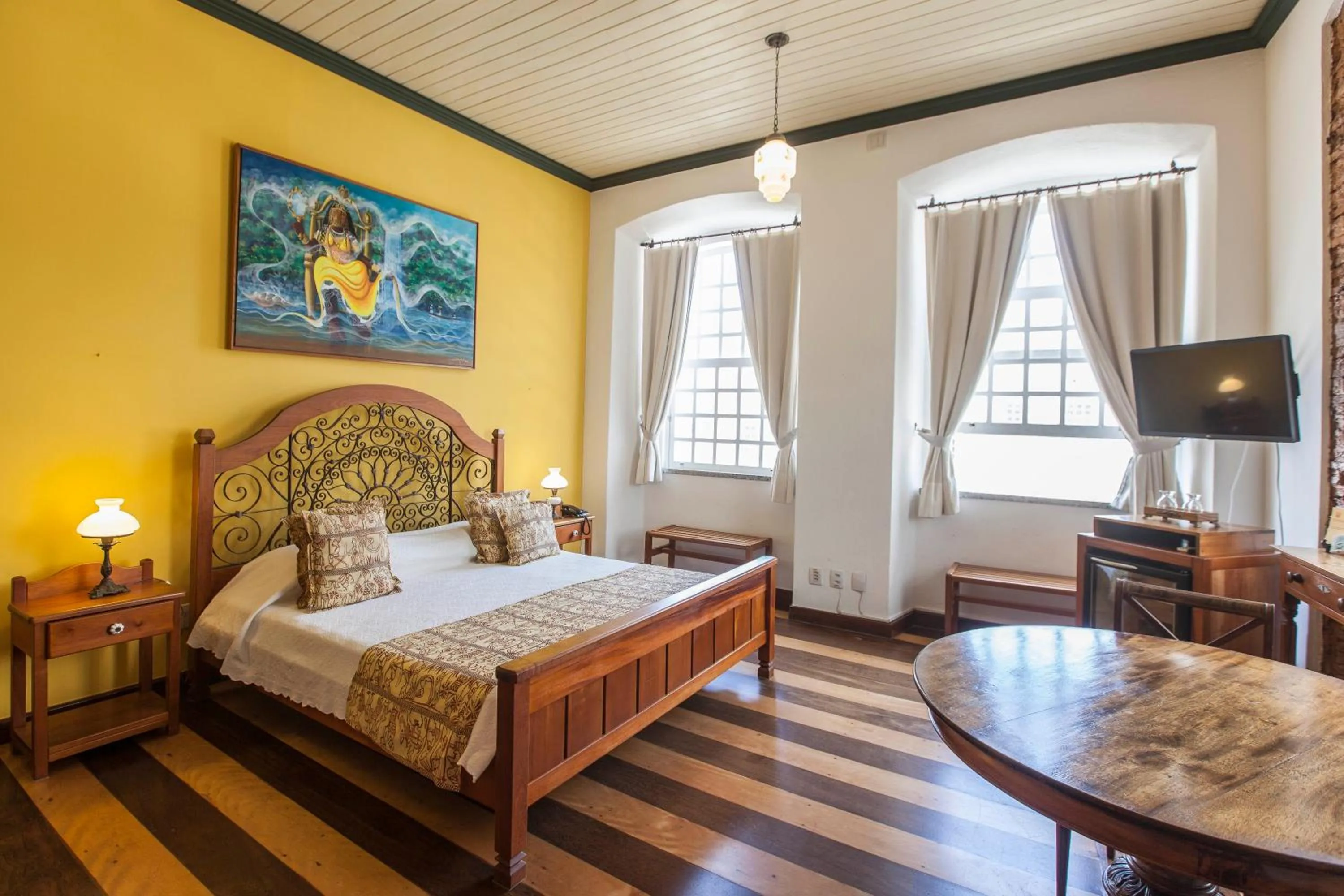 Bed in Pousada Solar dos Deuses