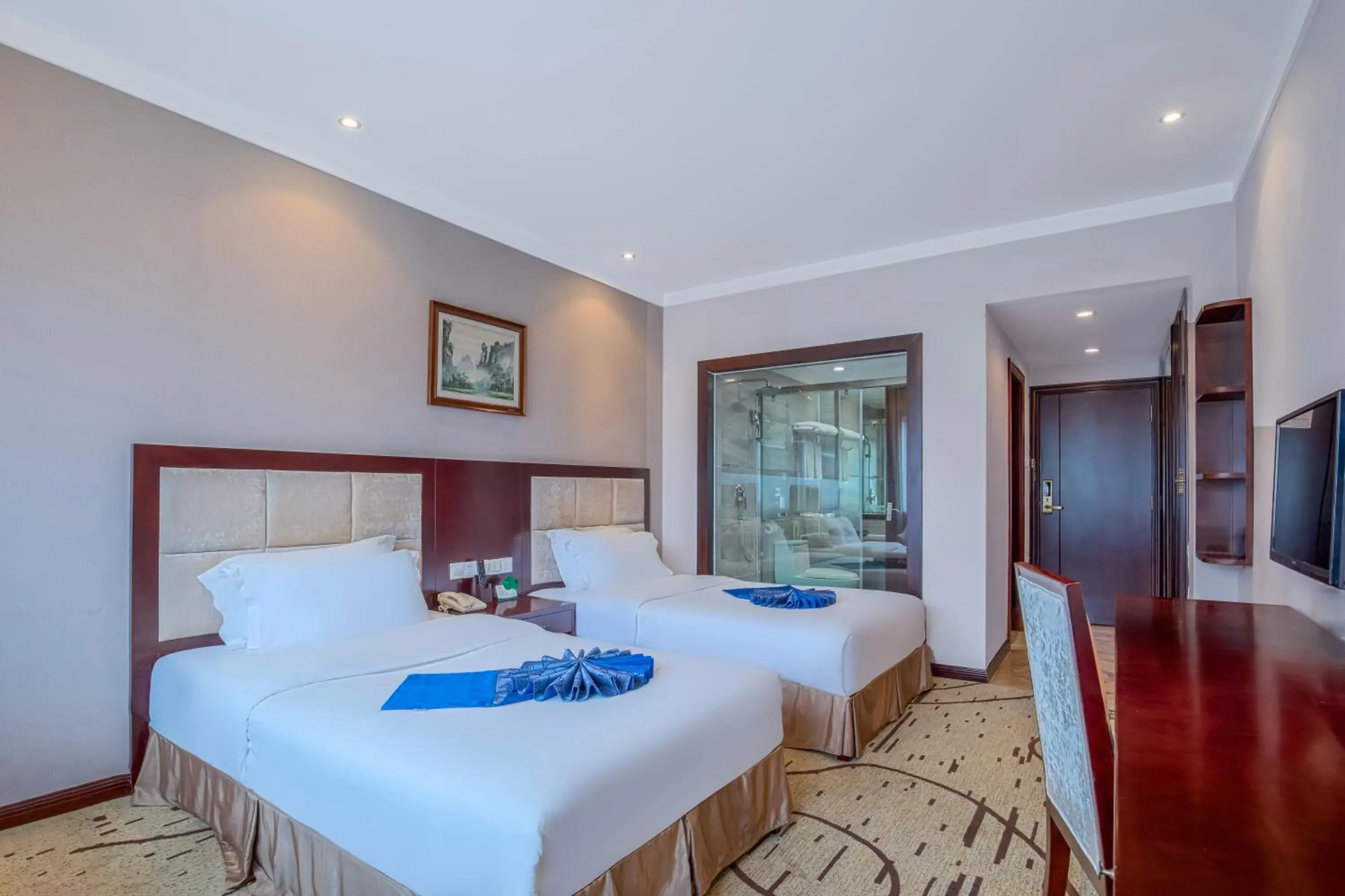 Bed in Zhangjiajie International Hotel Bed in Zhangjiajie International Hotel